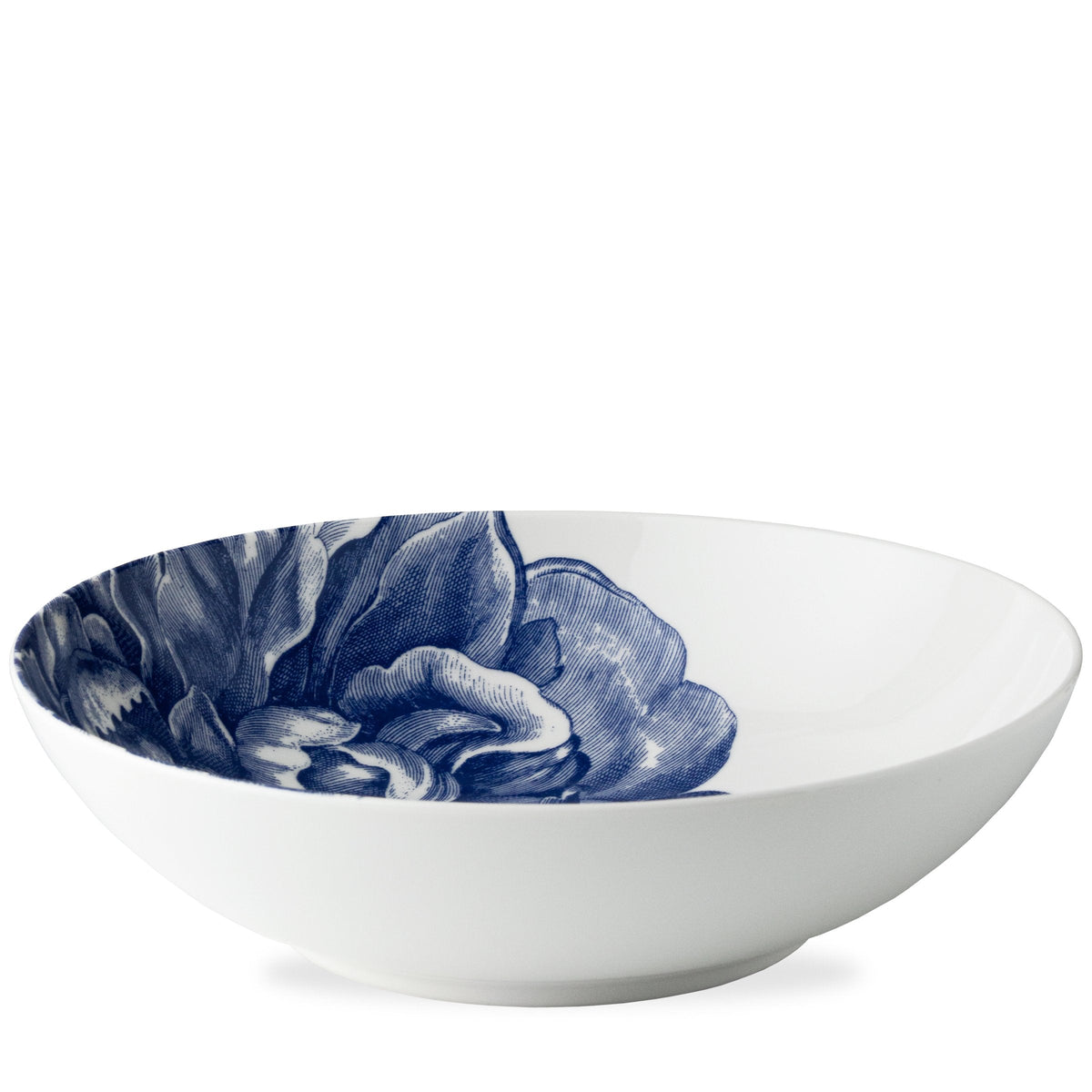 Side view of Peony Blue Wide Serving Bowl showcasing blue and white floral pattern with a white background