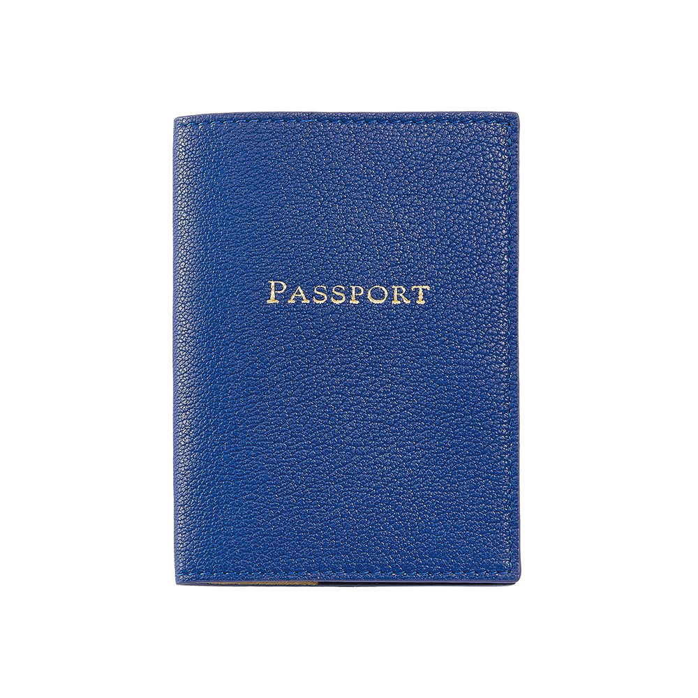 Front view of royal blue goatskin passport holder with pebbled leather and gold-stamped PASSPORT on white background