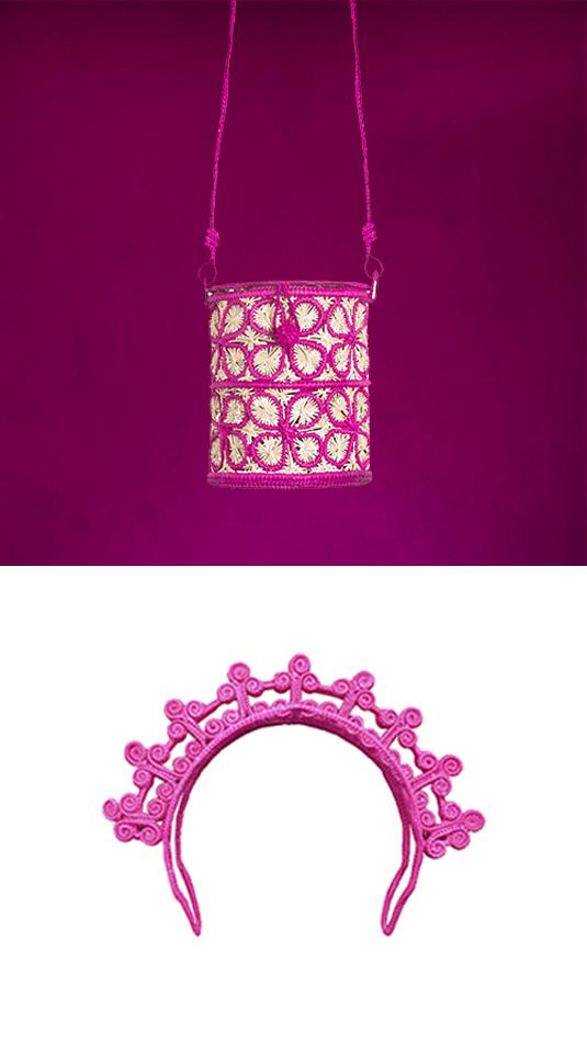 Front view of the fuchsia Arabesque Double Spiral Headpiece showcasing its ornate double spiral design on a white background