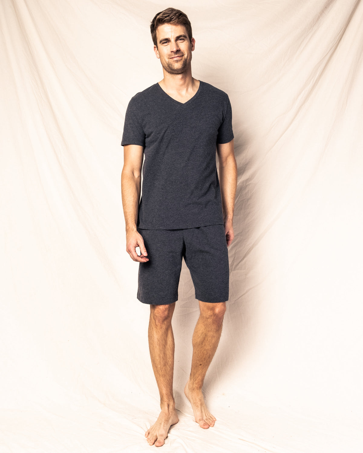 Front view of Pima Cotton men’s Dark Heather shorts showcasing mid-thigh length and elastic waistband with light fabric backdrop