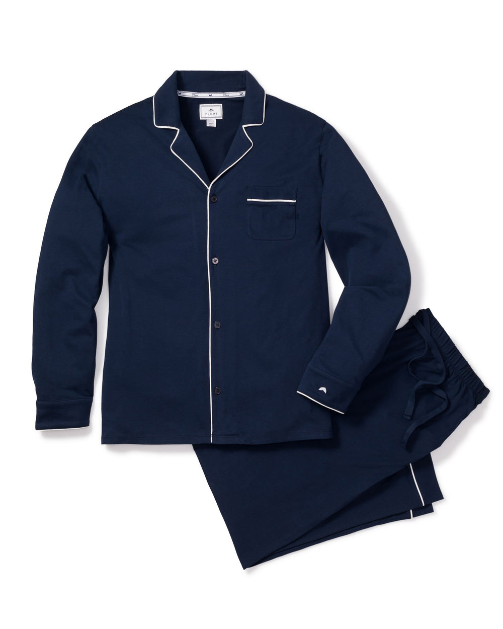 Flat lay of Men’s Navy Pima Cotton Pajama Set showcasing white piping, cuffs, chest pocket, drawstring on white background