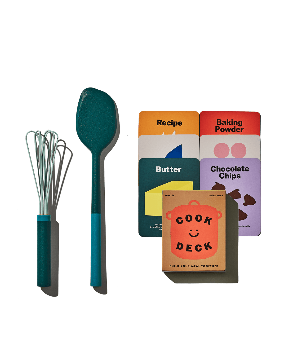 Front view of The Kids Set showcasing a mini Air Whisk, mini Spatula, and Cook Deck card game on a plain green background