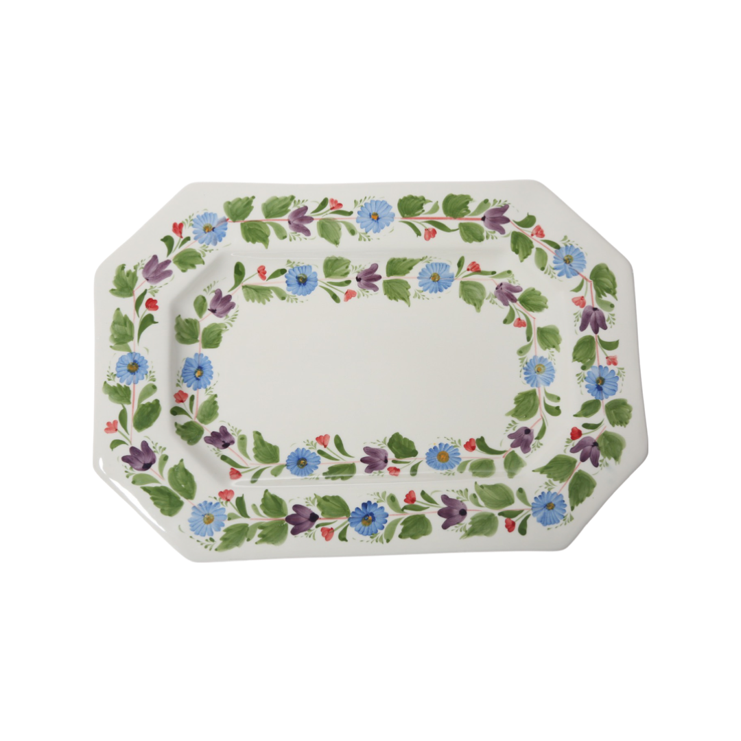 Top view of Maria Luisa Octagonal Platter showcasing a swirling floral pattern on a white background