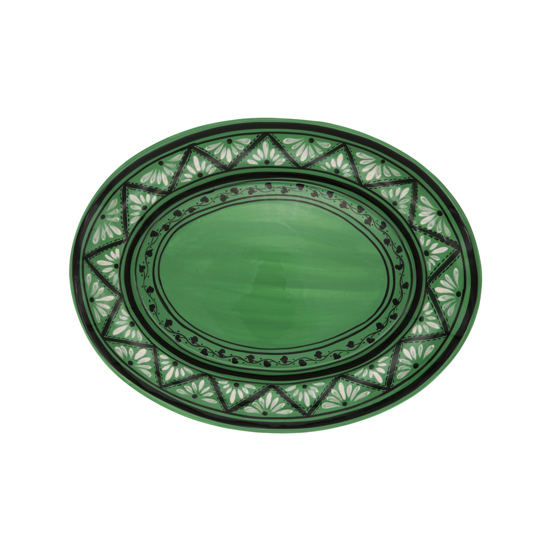 Top view of Gigi Green Oval Platter showcasing hand-painted geometric and wave patterns on a white background