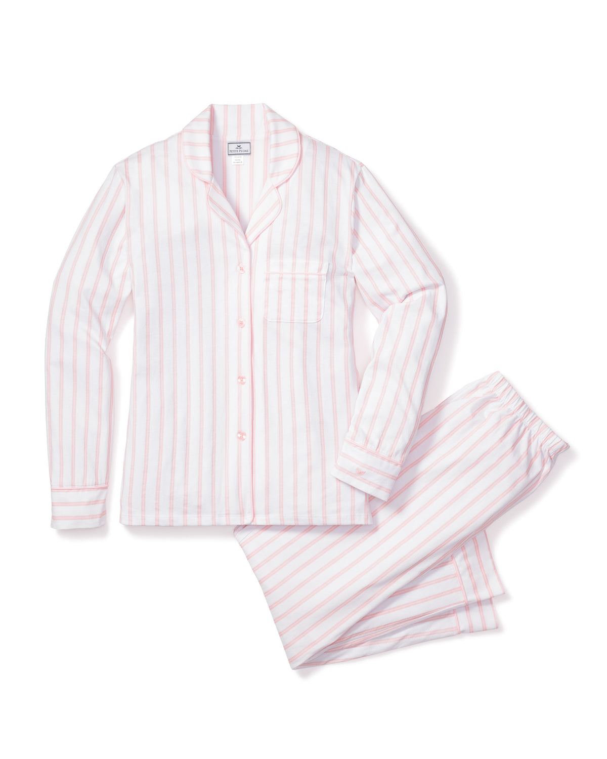 Flat lay of Luxe Pima pink striped pajama set showing button front top with chest pocket and elastic waist pants on white