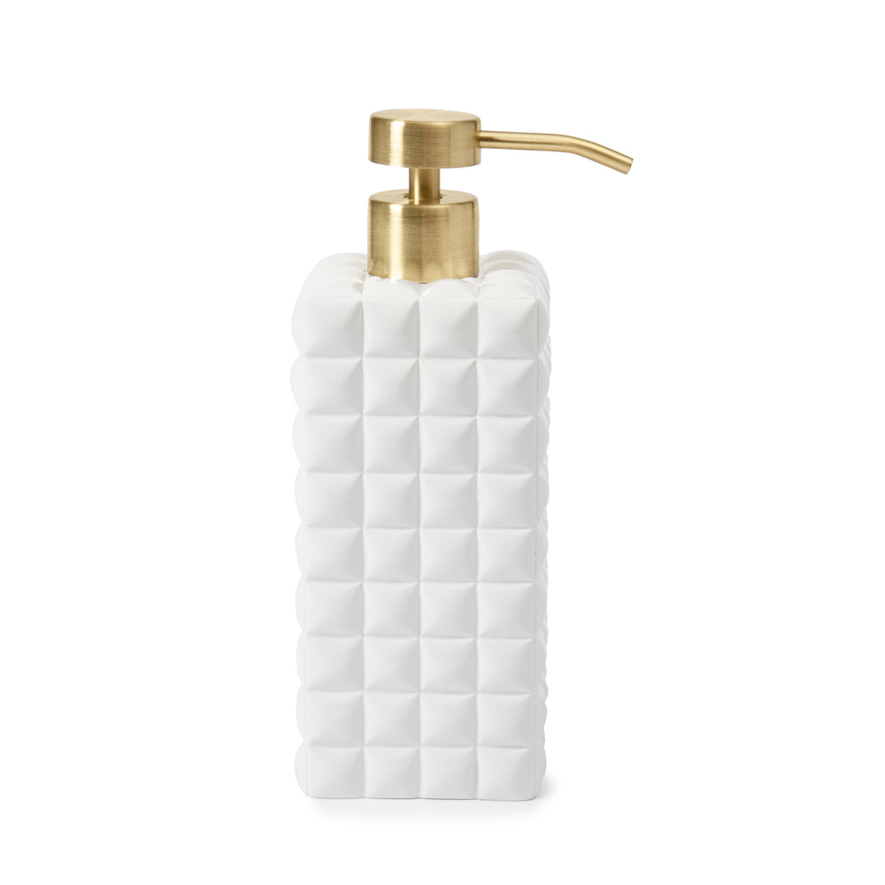 Front view of Piazza lotion dispenser showing white cube-textured resin body and brushed gold pump on white background
