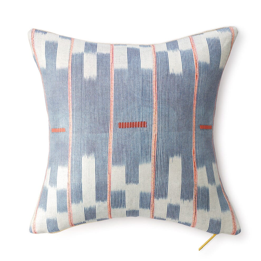 Front view of Chambray Lattice Baule pillow showcasing blue chambray lattice pattern, coral vertical accents, and exposed gold zipper on white background