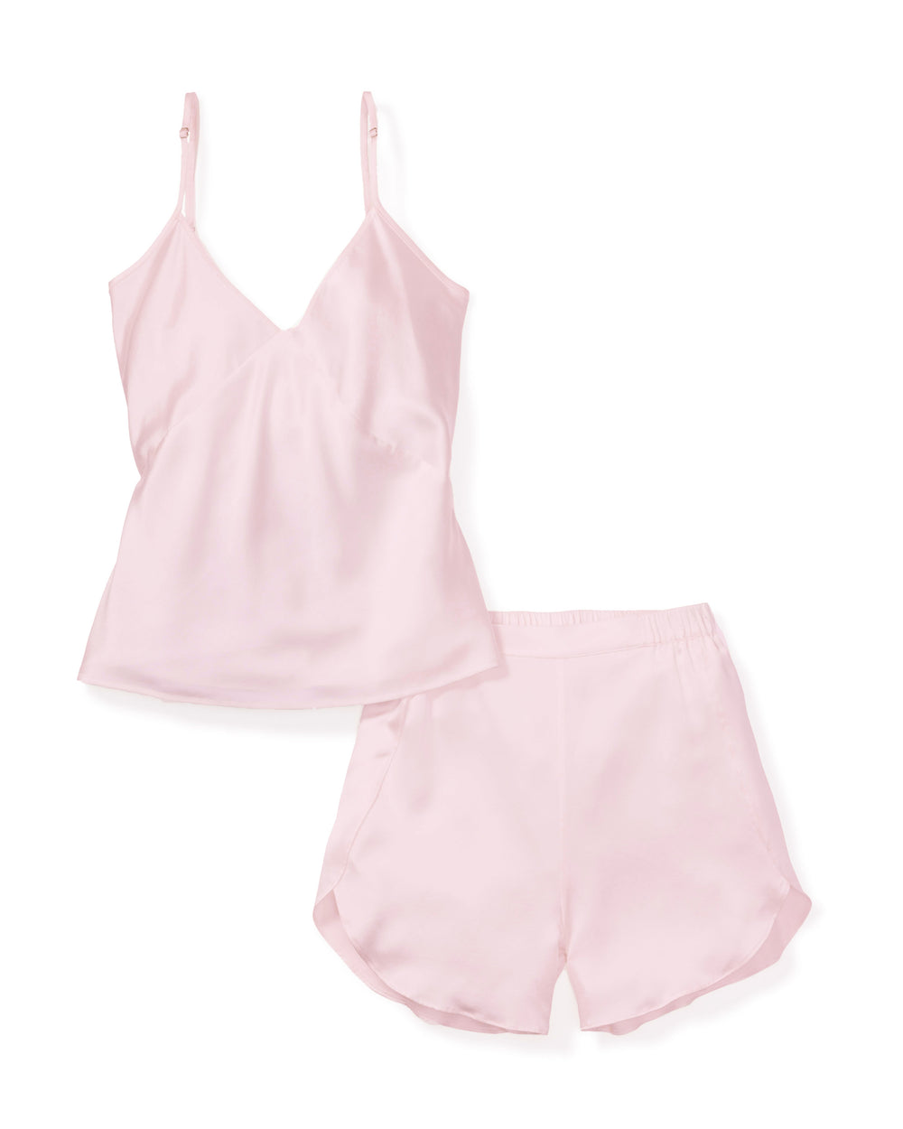Front view of women’s pink silk camisole and short set showcasing spaghetti straps and elastic waistband on white background