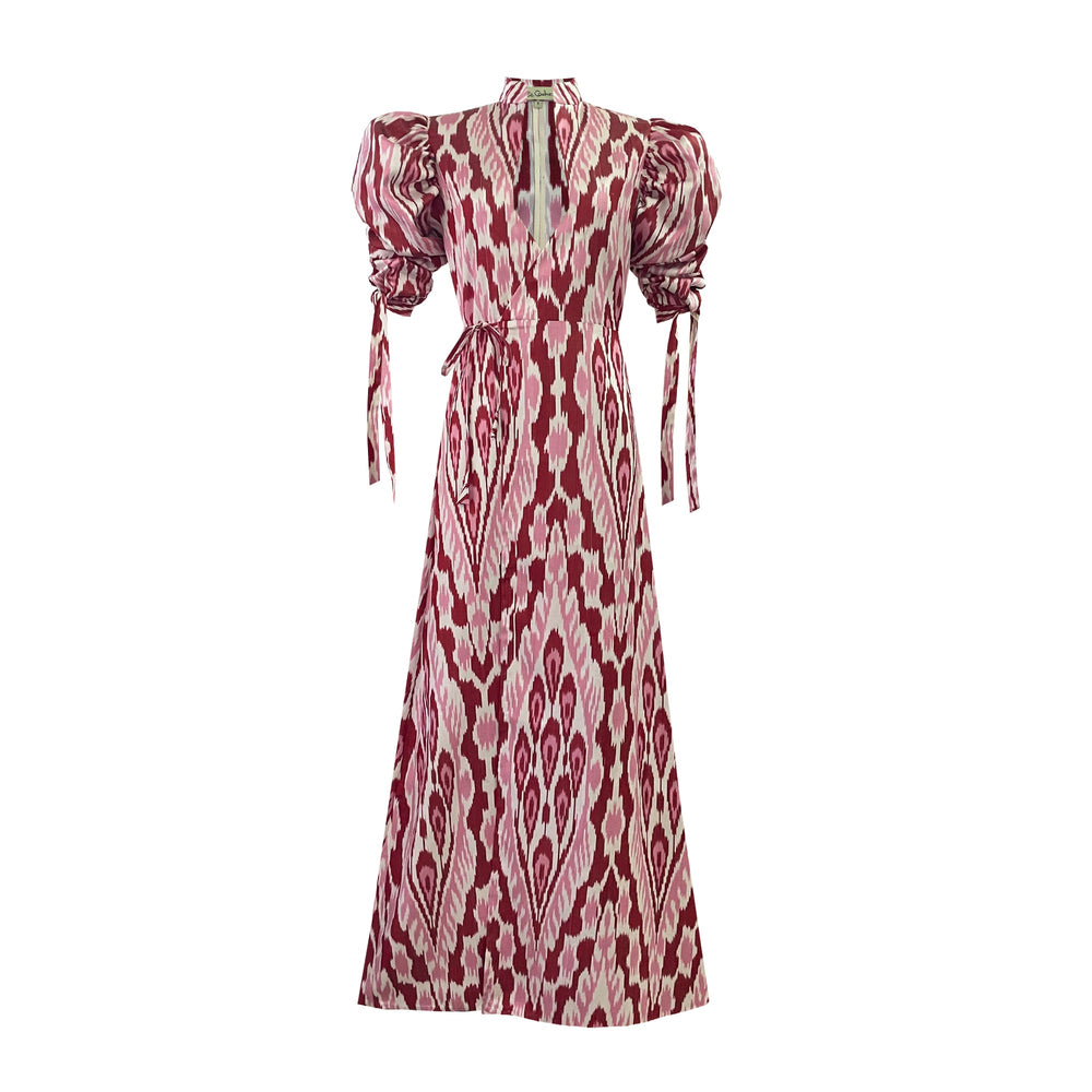 Front view of Pink Candela Dress with Uzbek hand-loom ikat print, deep geometrical neckline, gathered puff sleeves, white background