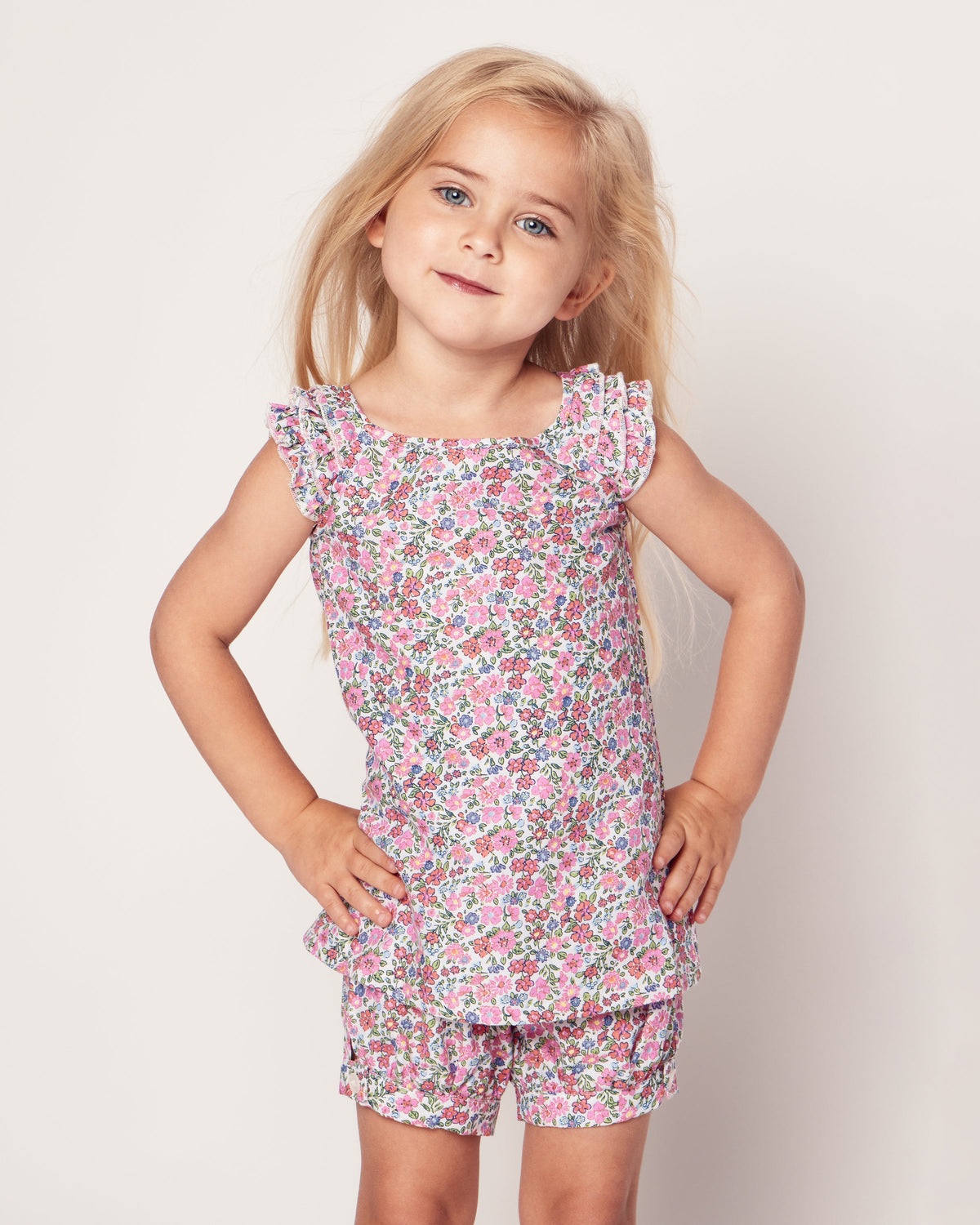 Front view of Children’s Fleurs de Rose Amelie Short Set showcasing floral print on a child against a light background