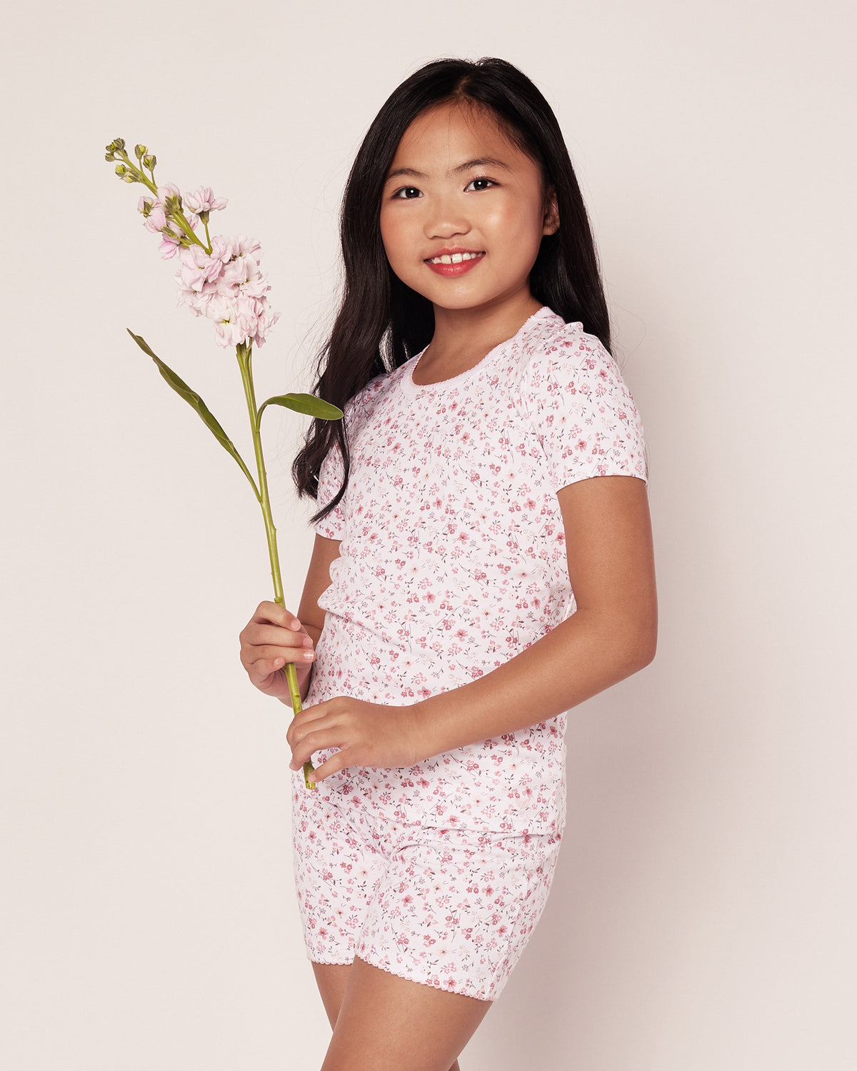 Front view of Children’s 100% Pima Cotton Dorset Floral Short Set with pink floral pattern and snug fit