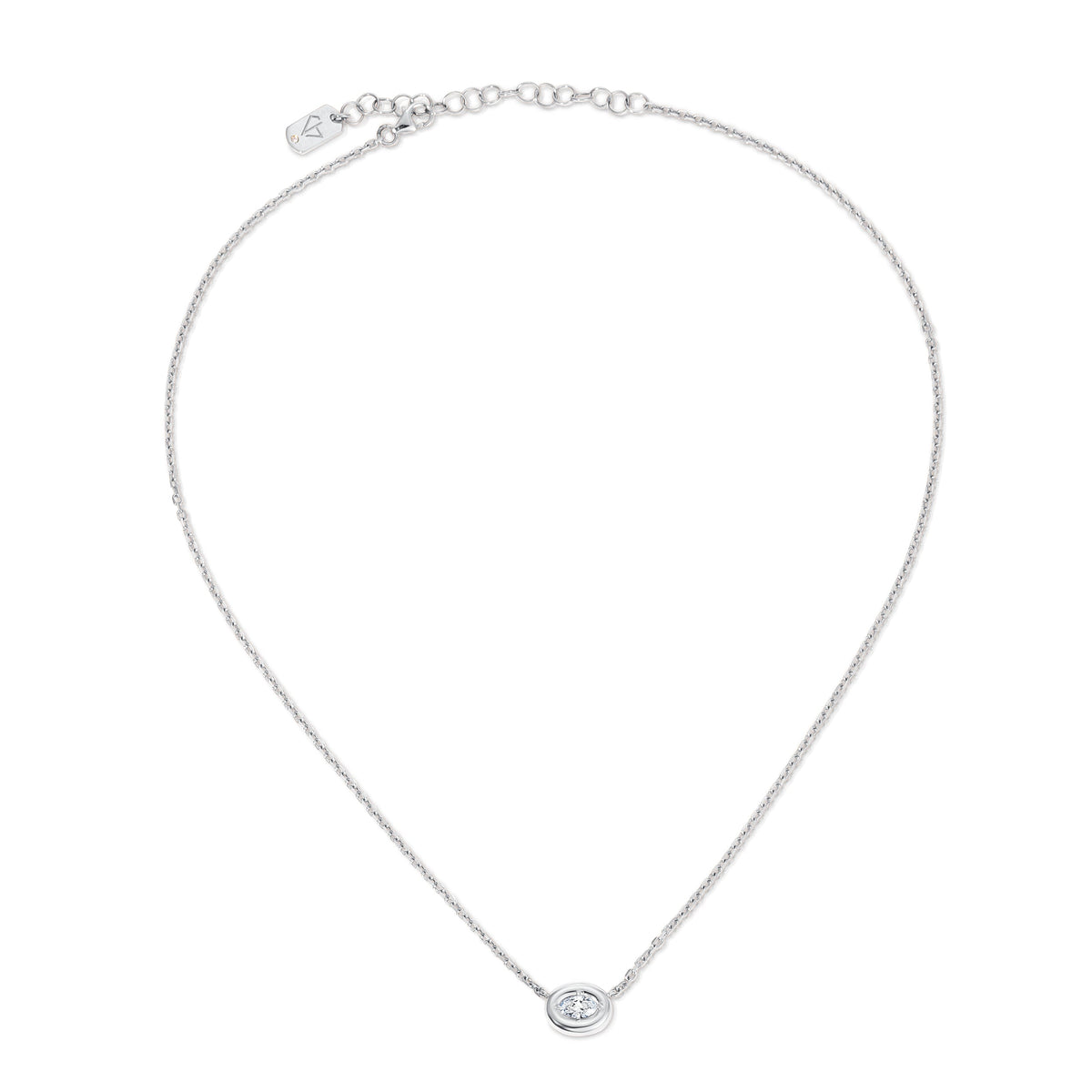 Top-down view of Ovalis necklace showcasing a puffy bezel oval diamond pendant on a delicate 14K white gold chain with white background