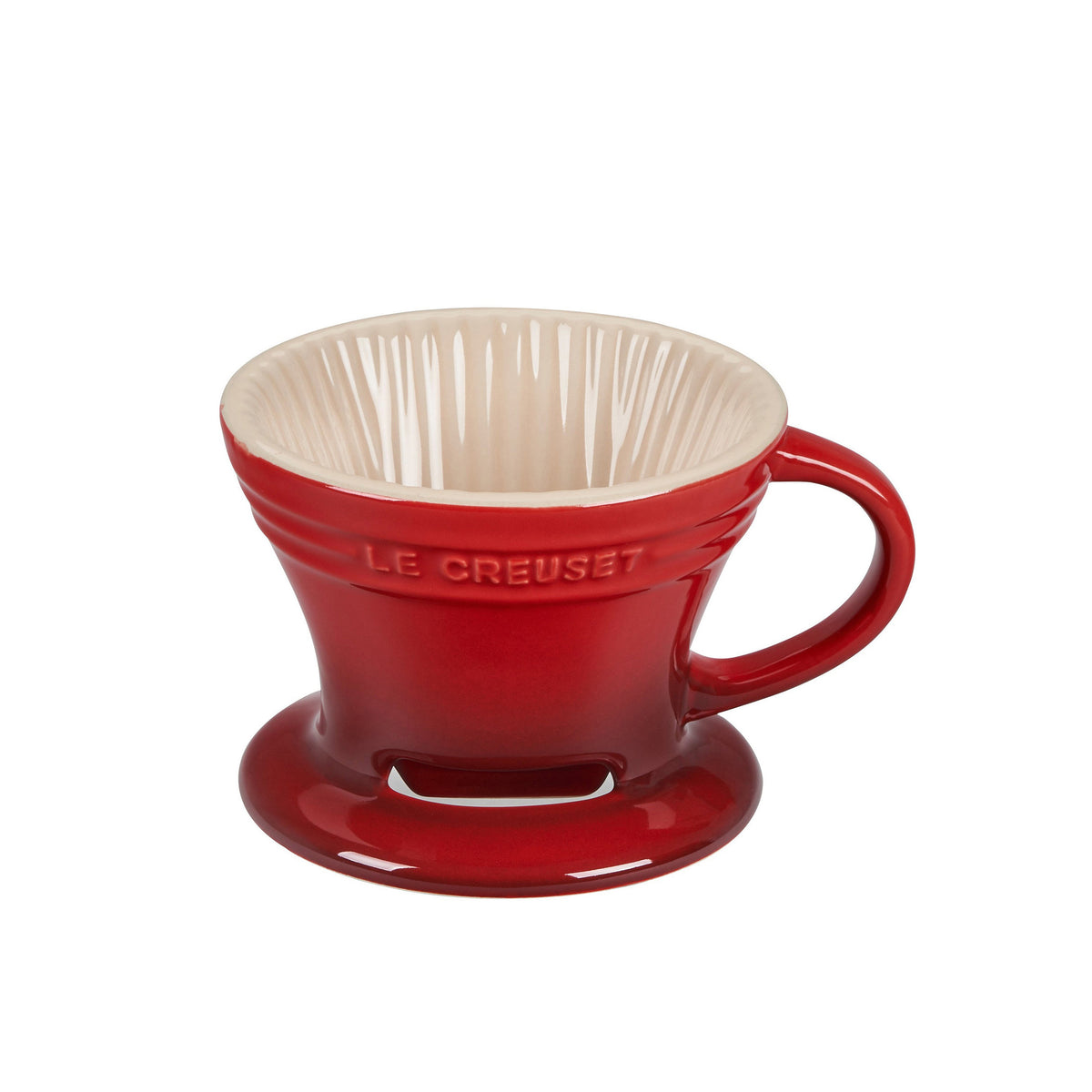 Front view of Le Creuset pour over coffee maker showcasing its Cerise stoneware body and handle on a white background