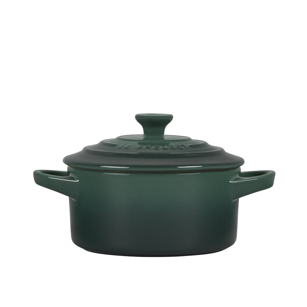 Front view of Mini Round Cocotte showing lid knob and side handles in artichaut green on white background