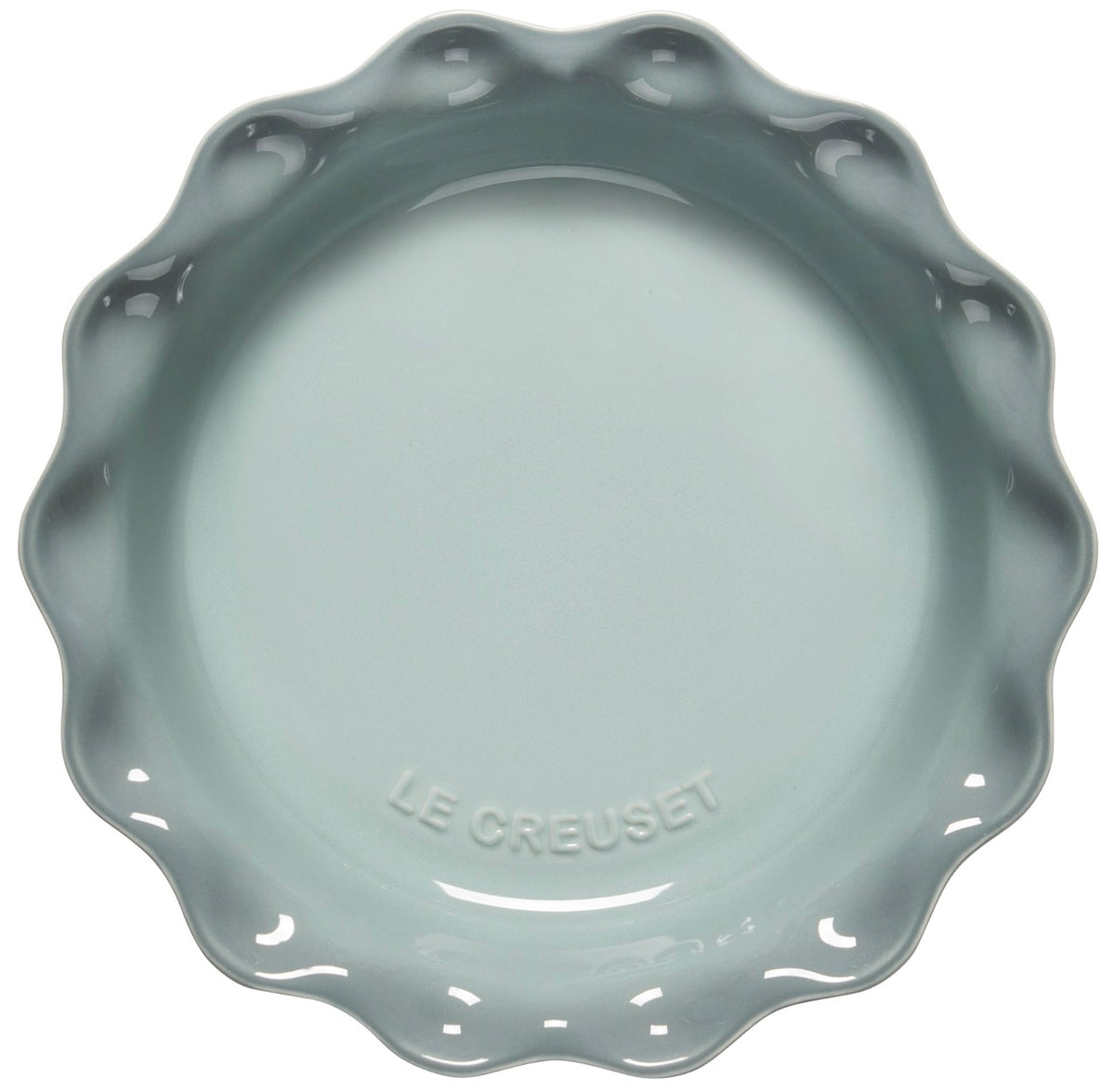 Top view of Heritage Pie Dish in Sea Salt showcasing its glossy glaze and dimpled edge on a white background