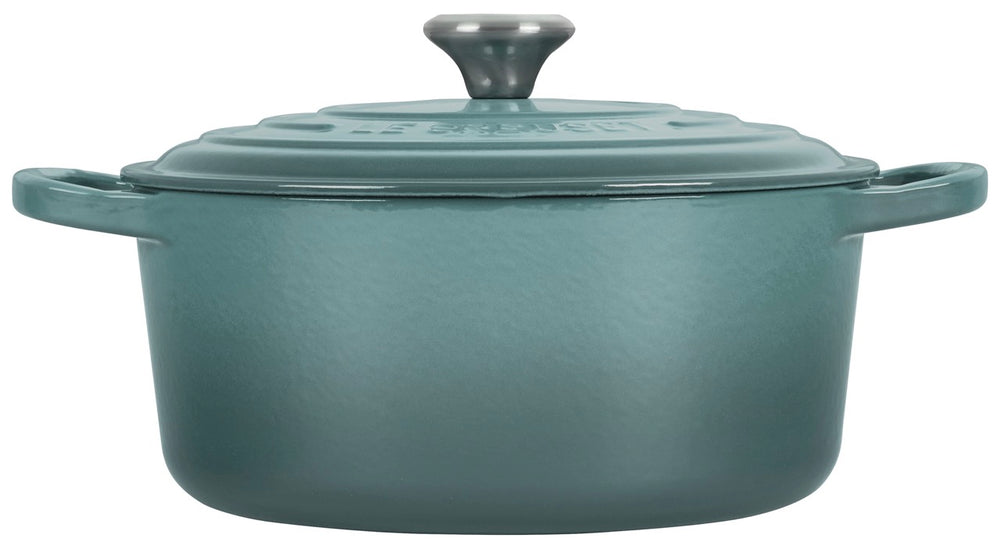 Front view of Signature Round Dutch Oven in Sea Salt showcasing its covered design and wide loop handles with a white background