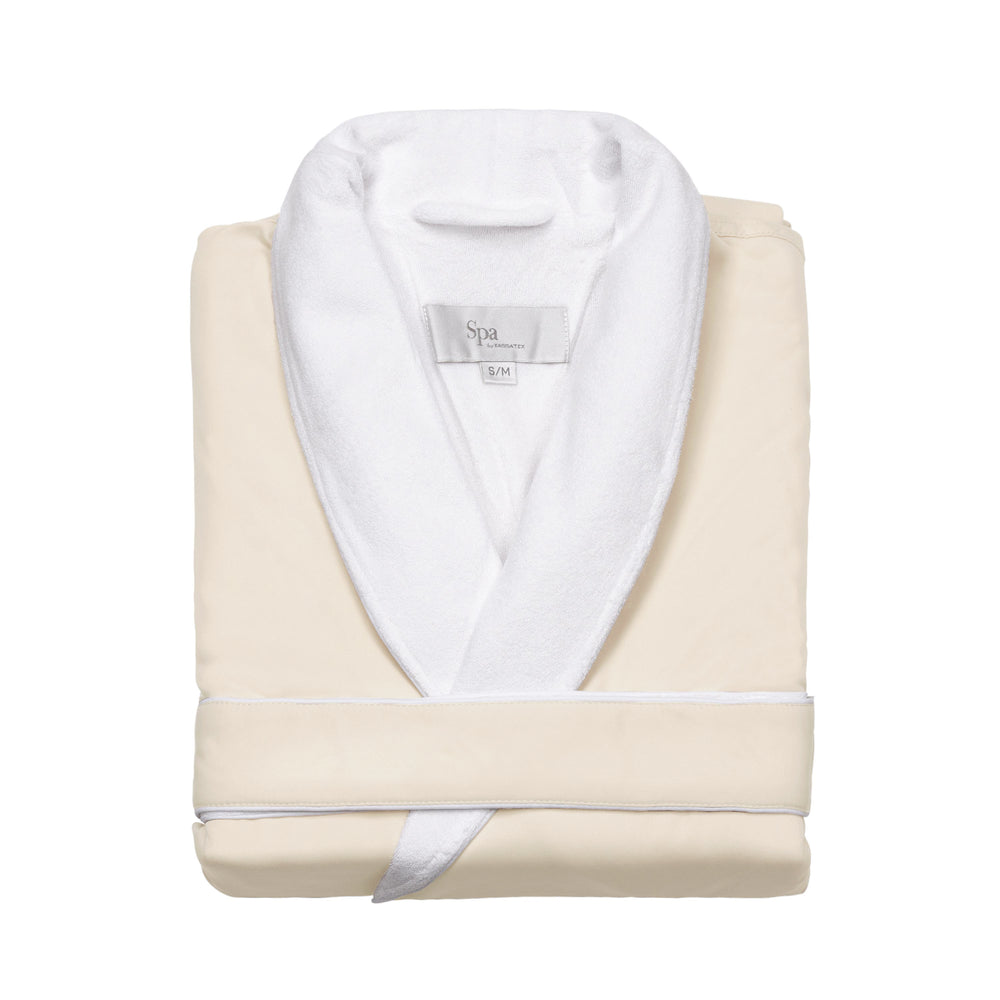 Folded front view of Spa bathrobe in bone showcasing white terry shawl collar, visible Spa label and belt on white background