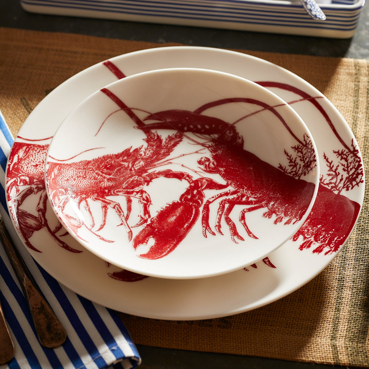 Close-up of Red Lobster Coupe Salad Plate showcasing red lobster illustrations on white porcelain