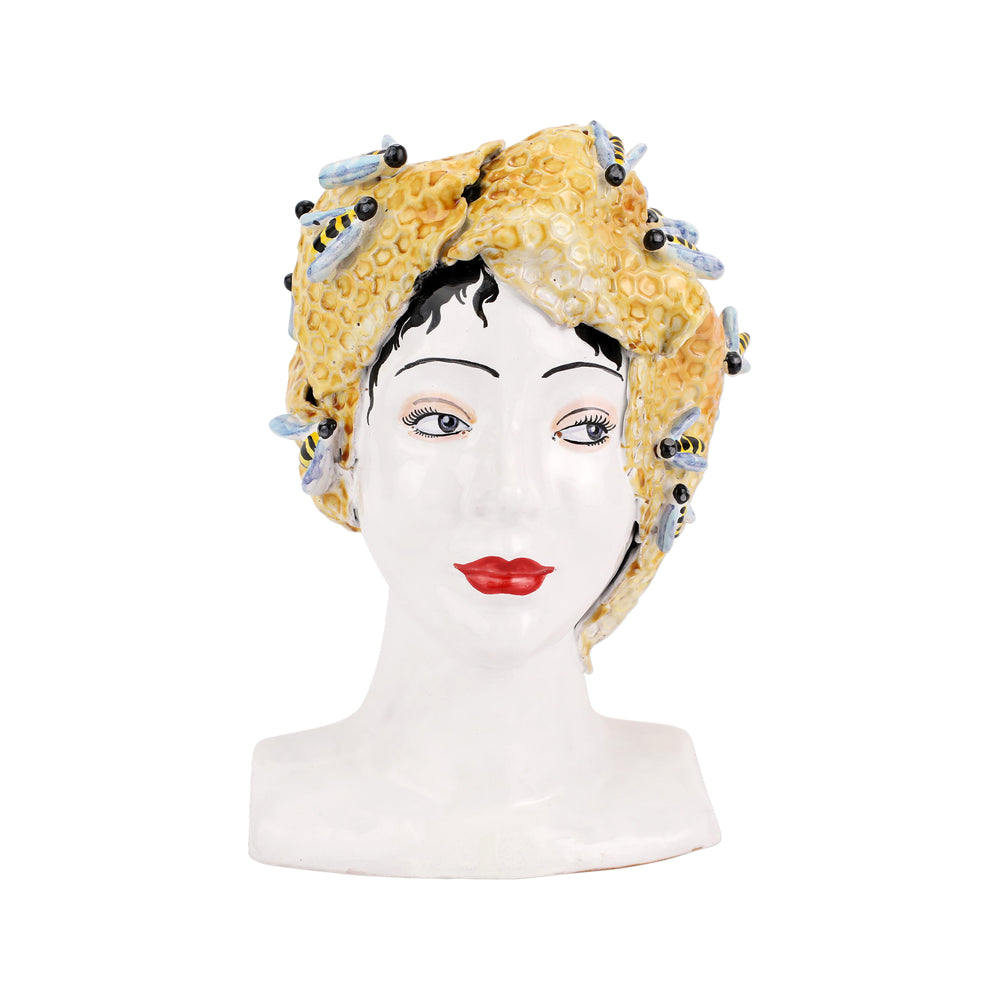 Front view of Sicilian Heads honeycomb head bust, terra cotta with yellow honeycomb headdress, ceramic bees and white face