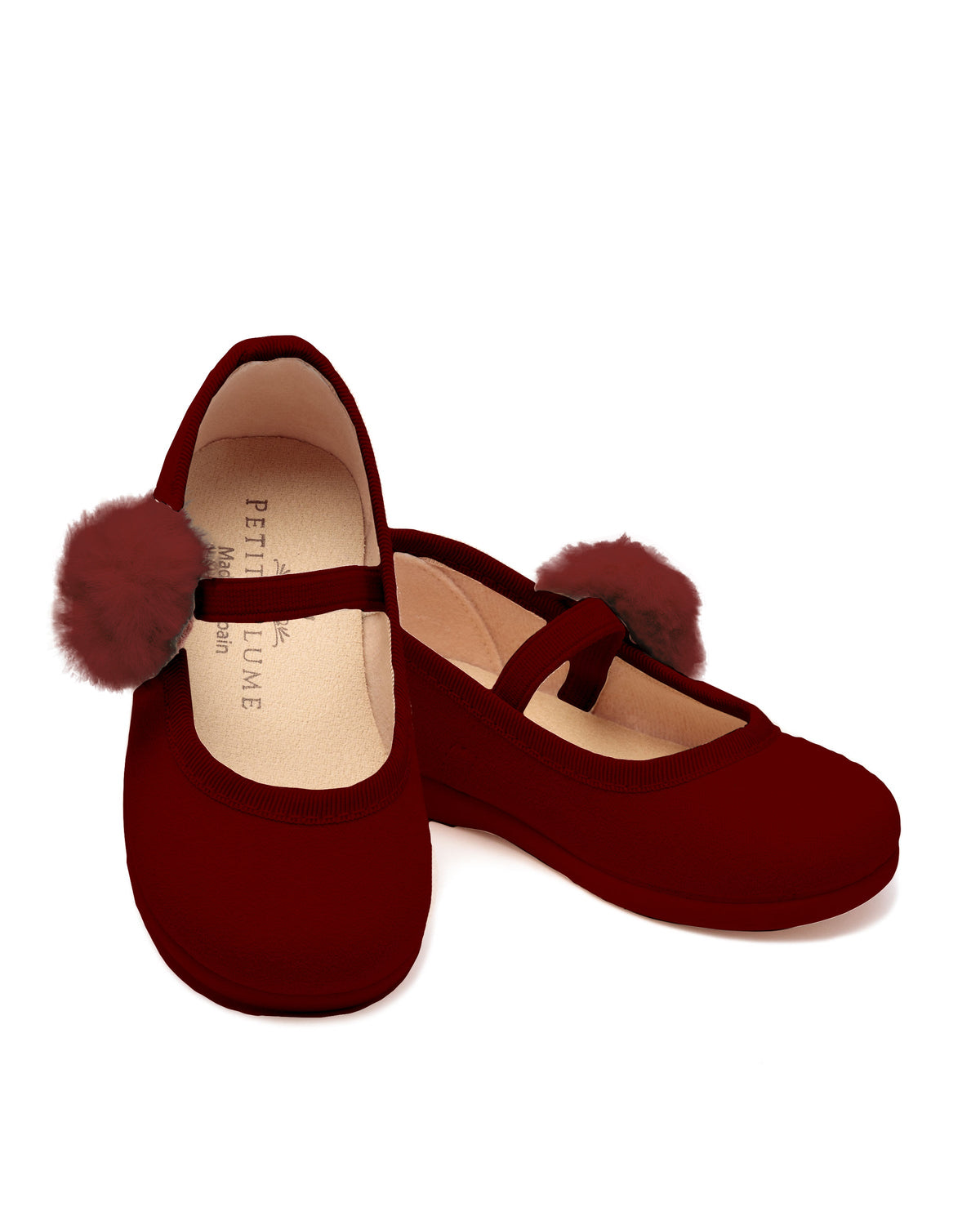 Top view of The Delphine Slipper in Bordeaux Suede with a Festive Pom showing paired velvet slippers with soft insoles and festive pom poms