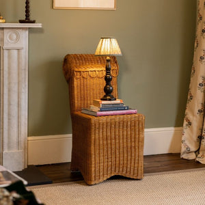 Letty Slipper chair as a side table.