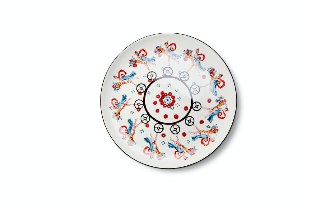 Top view of Playplates Cornucopia plate showing red-and-blue Roman-style figures and cornucopia motifs on white background