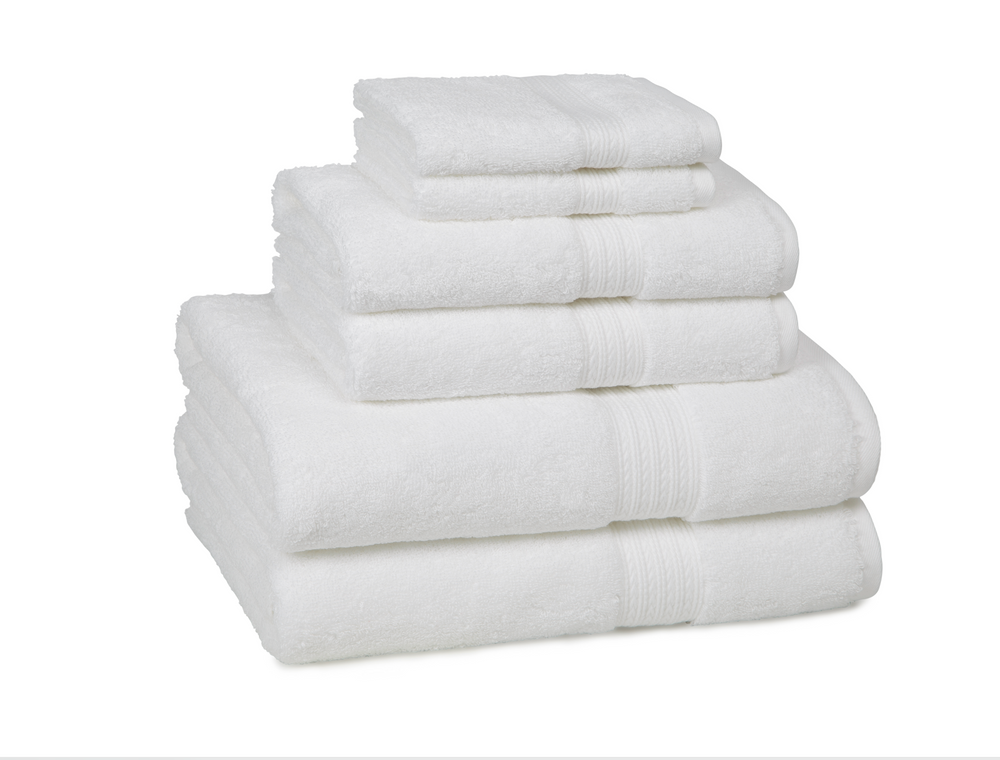 Front view of Kassadesign white towel set showcasing ribbed band detail on a white background