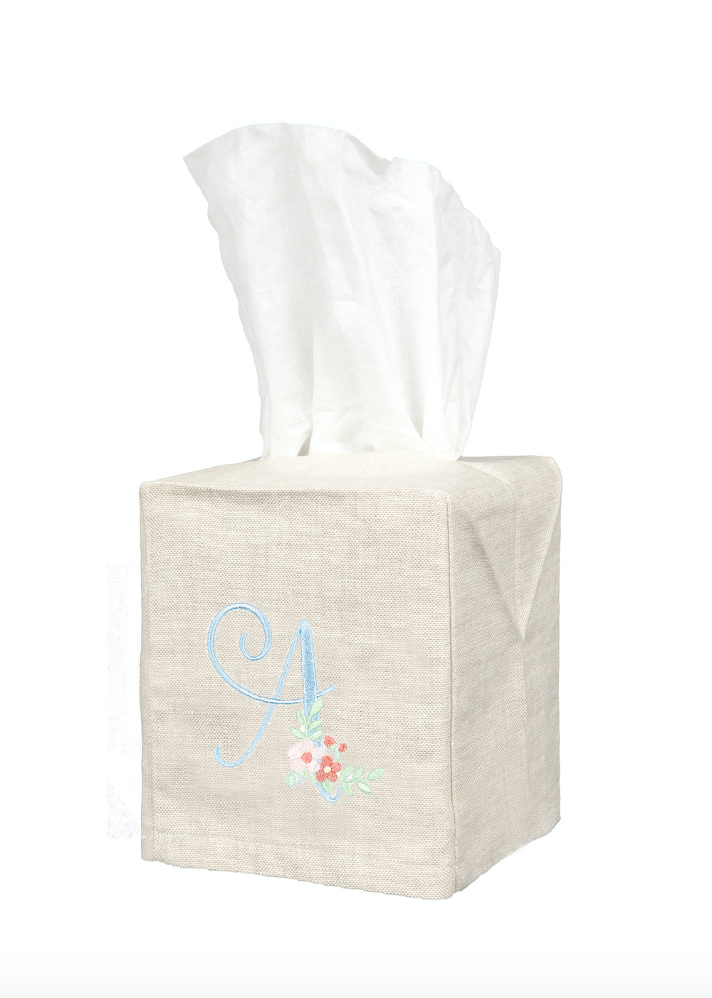 Front view of natural linen tissue box cover showing embroidered blue initial A with small floral motif on white background