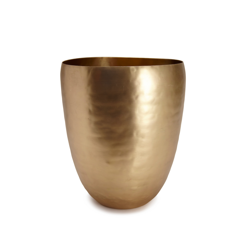 Front view of Nile bath waste basket showcasing hammered brass finish on white background