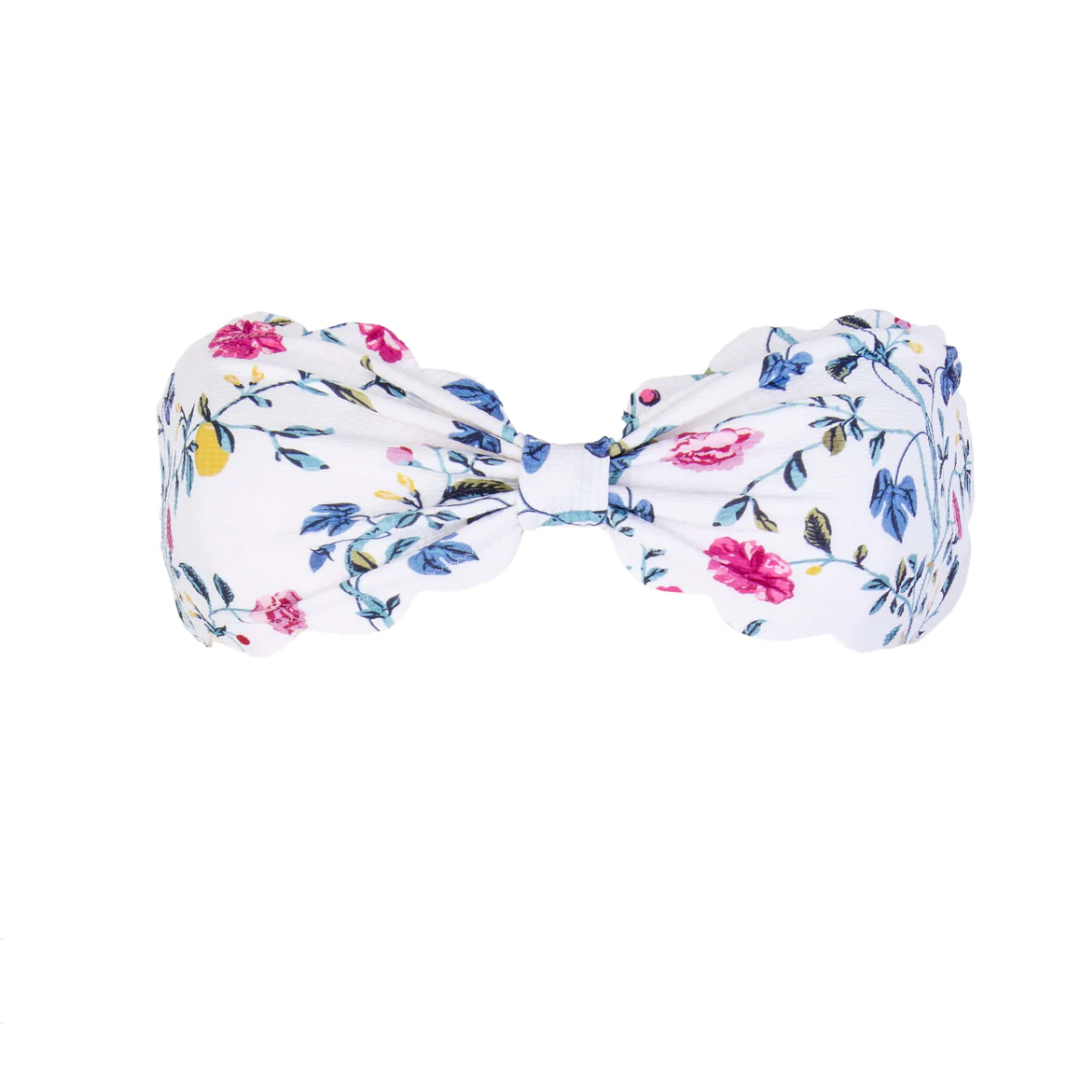 Front view of Antibes Top in White Floral showcasing its floral print and scalloped edge on a white background