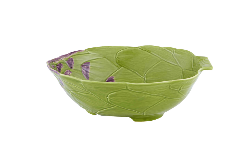 Side view of green ceramic artichoke salad bowl showing leaf-vein texture and small purple accents on white background