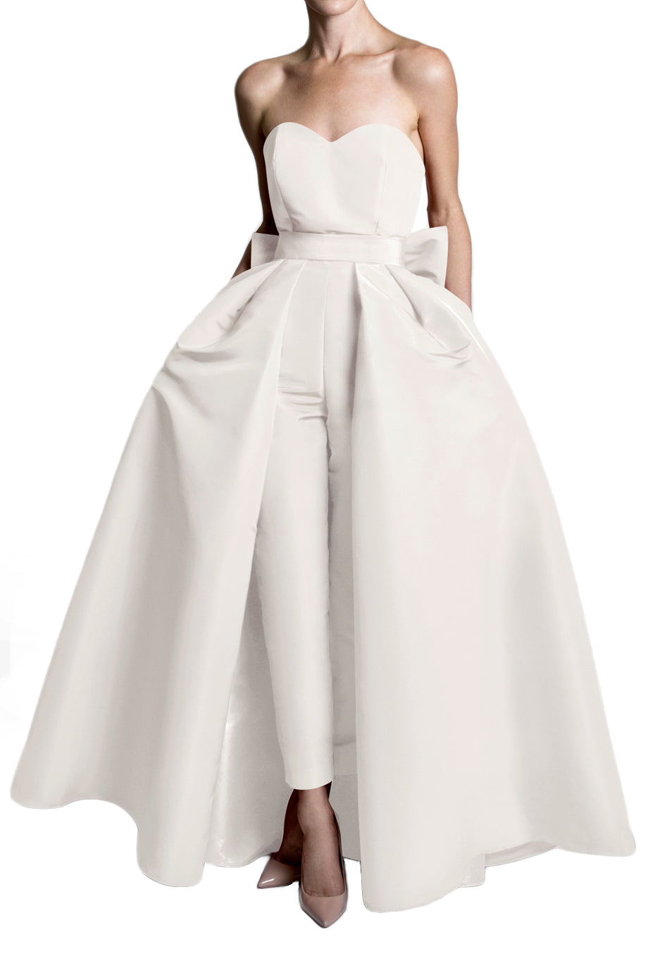 Front view of Silk Faille Bow Back Jumpsuit with Convertible Skirt showing detachable skirt and cigarette-style trousers
