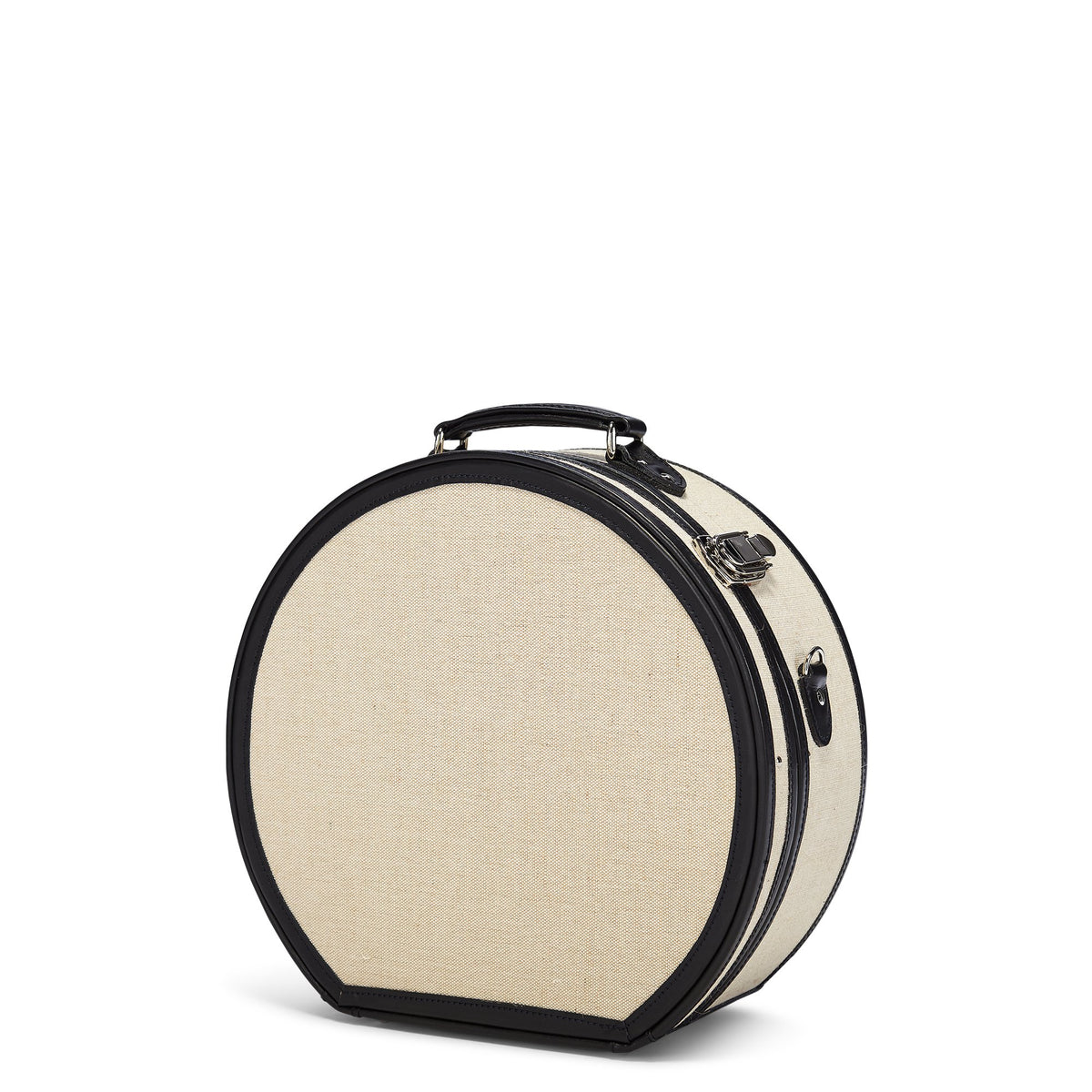 Front three-quarter view of The Editor Large Hatbox showcasing ivory body, black straps, and silver latches on white background