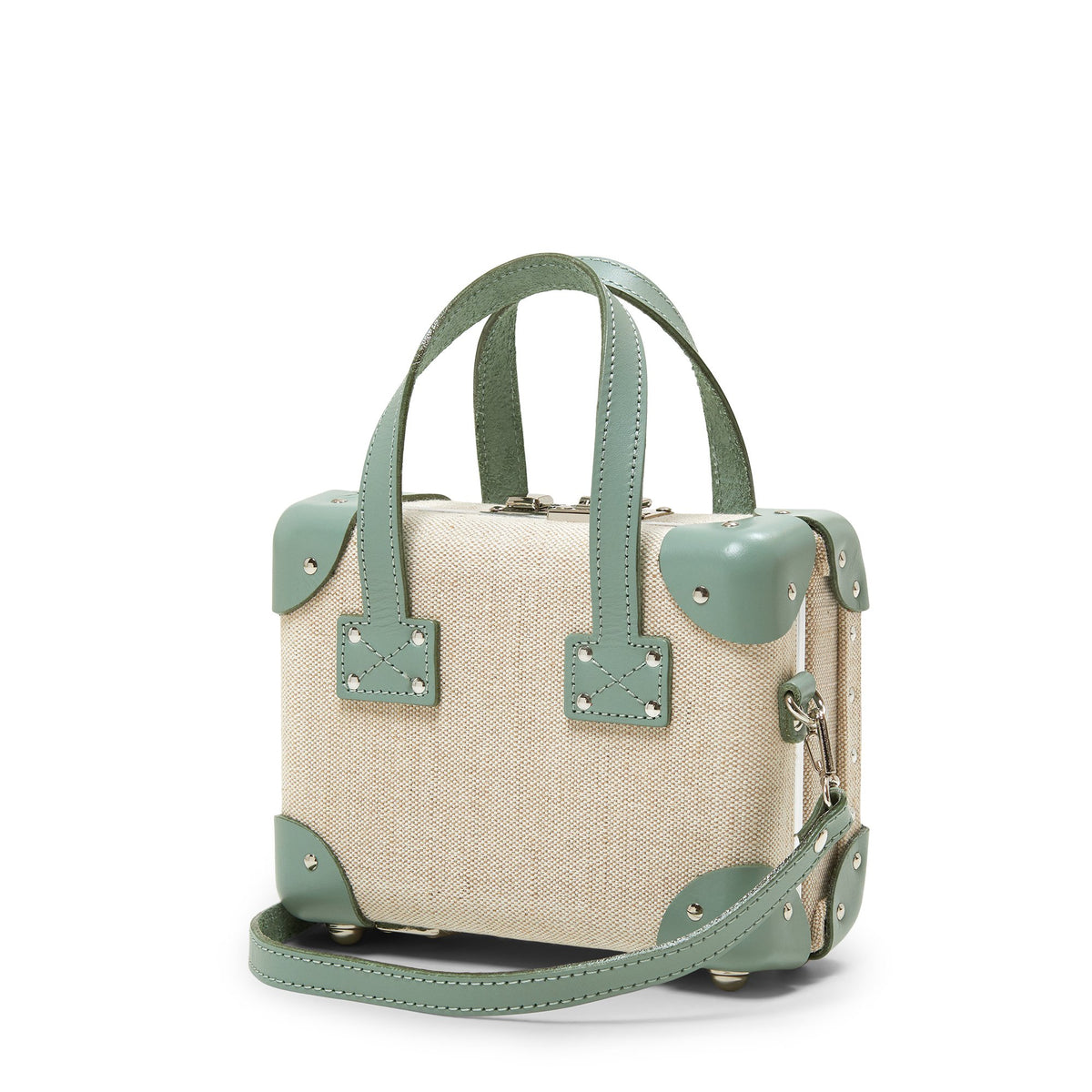 Front view of The Editor Mini showcasing sea green leather straps and ivory body with a white background