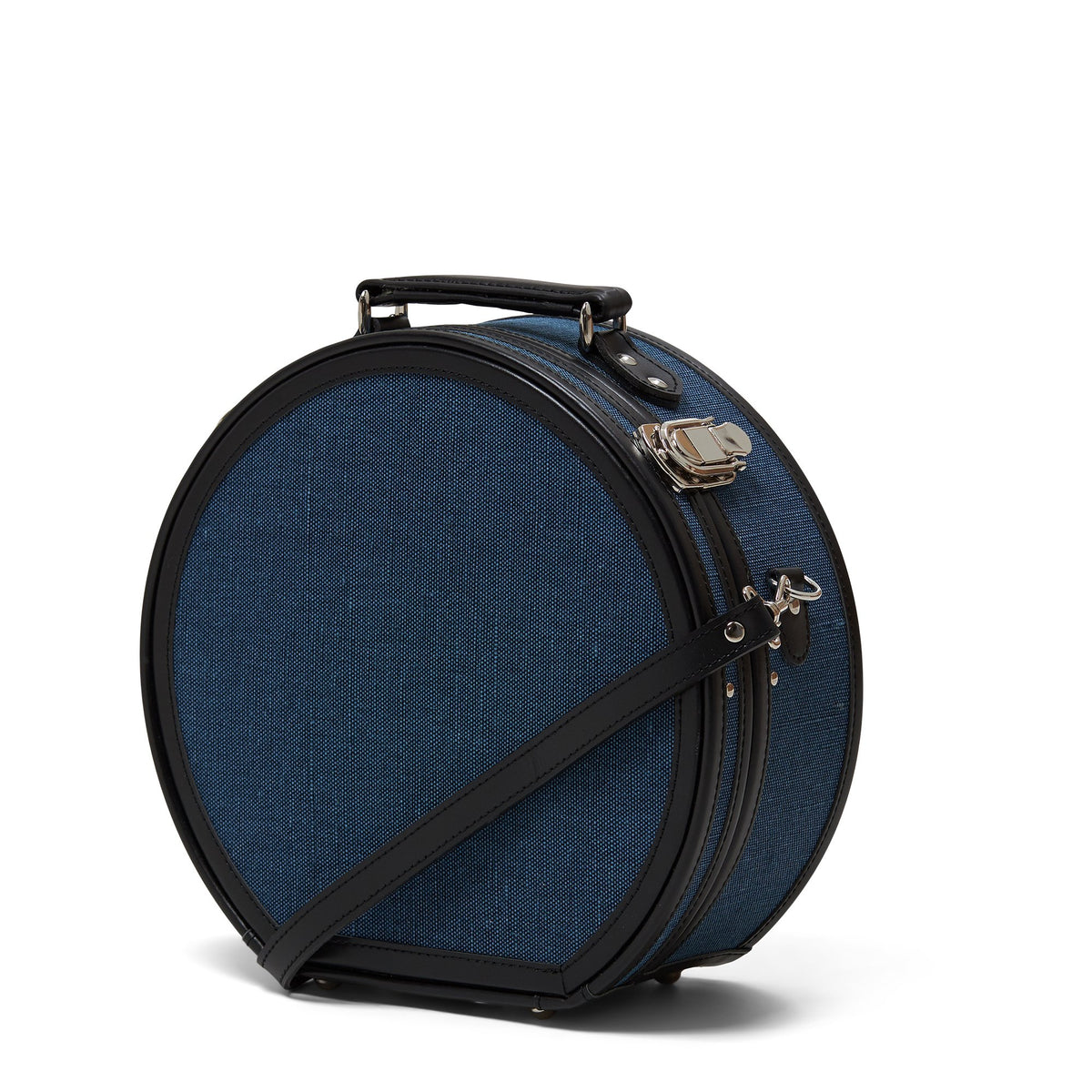 Front three-quarter view of The Editor in Navy Hatbox Small showcasing silver latches and black straps with a white background