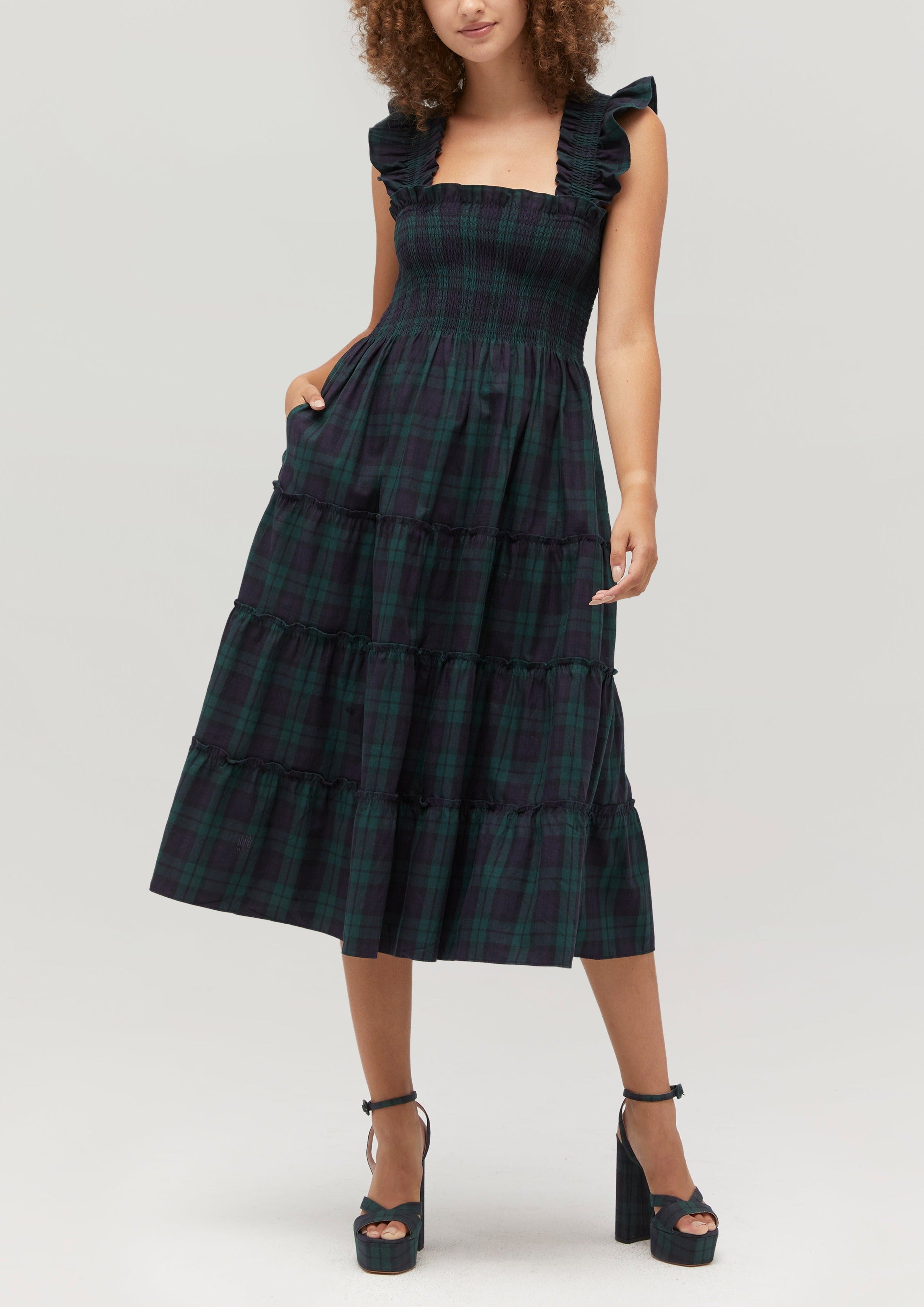 Gabriella is 5' 9.5" and wears a size XS in the Blackwatch Tartan color: Blackwatch Tartan