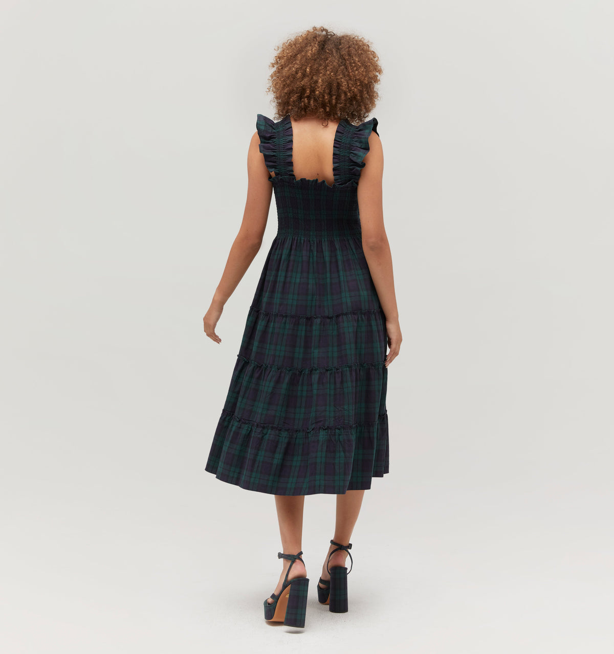 Gabriella is 5' 9.5" and wears a size XS in the Blackwatch Tartan color: Blackwatch Tartan