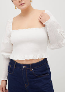 Anna is 5’8” and wears a size L in the White Cotton color: White Cotton