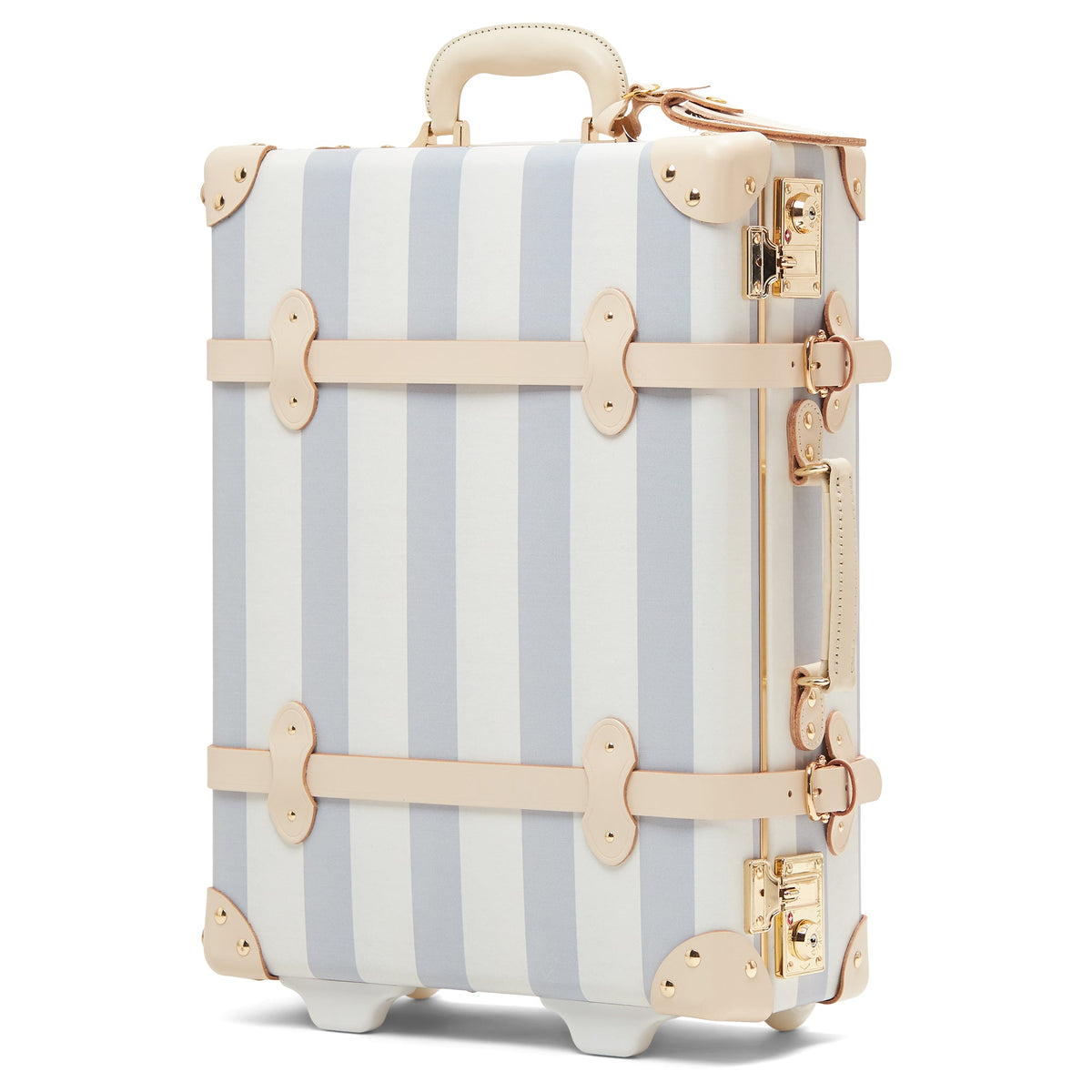 Three-quarter front view of The Illustrator Blue carry-on showcasing vertical blue and white stripes, beige leather straps and gold hardware on a white background