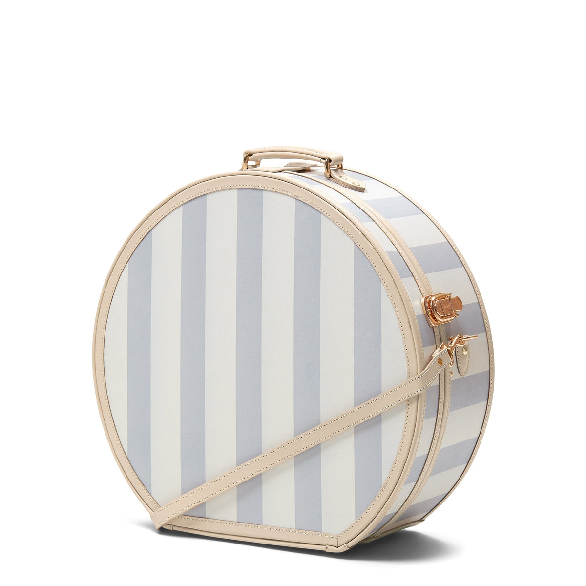 Angled view of The Illustrator Deluxe Blue Hatbox showcasing blue stripes, tan leather trim and gold hardware on a white background