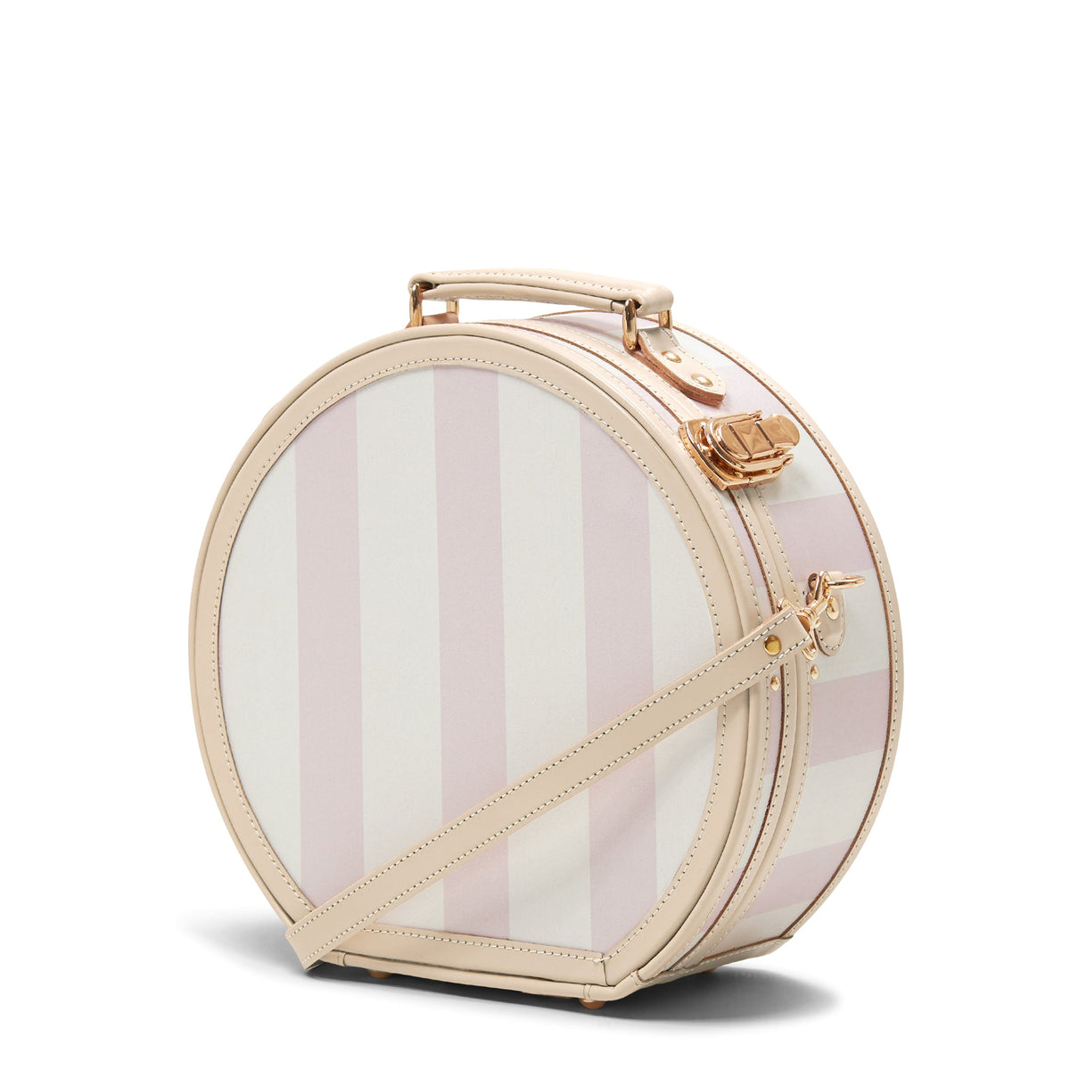 Angled front view of The Illustrator pink striped small hatbox showing leather trim, gold hardware and shoulder strap on white background