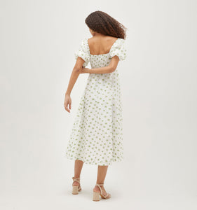 Elah is 5Õ11Ó and wears a size XS in the Olive/Coral Floral Jacquard color: Olive/Coral Floral Jacquard
