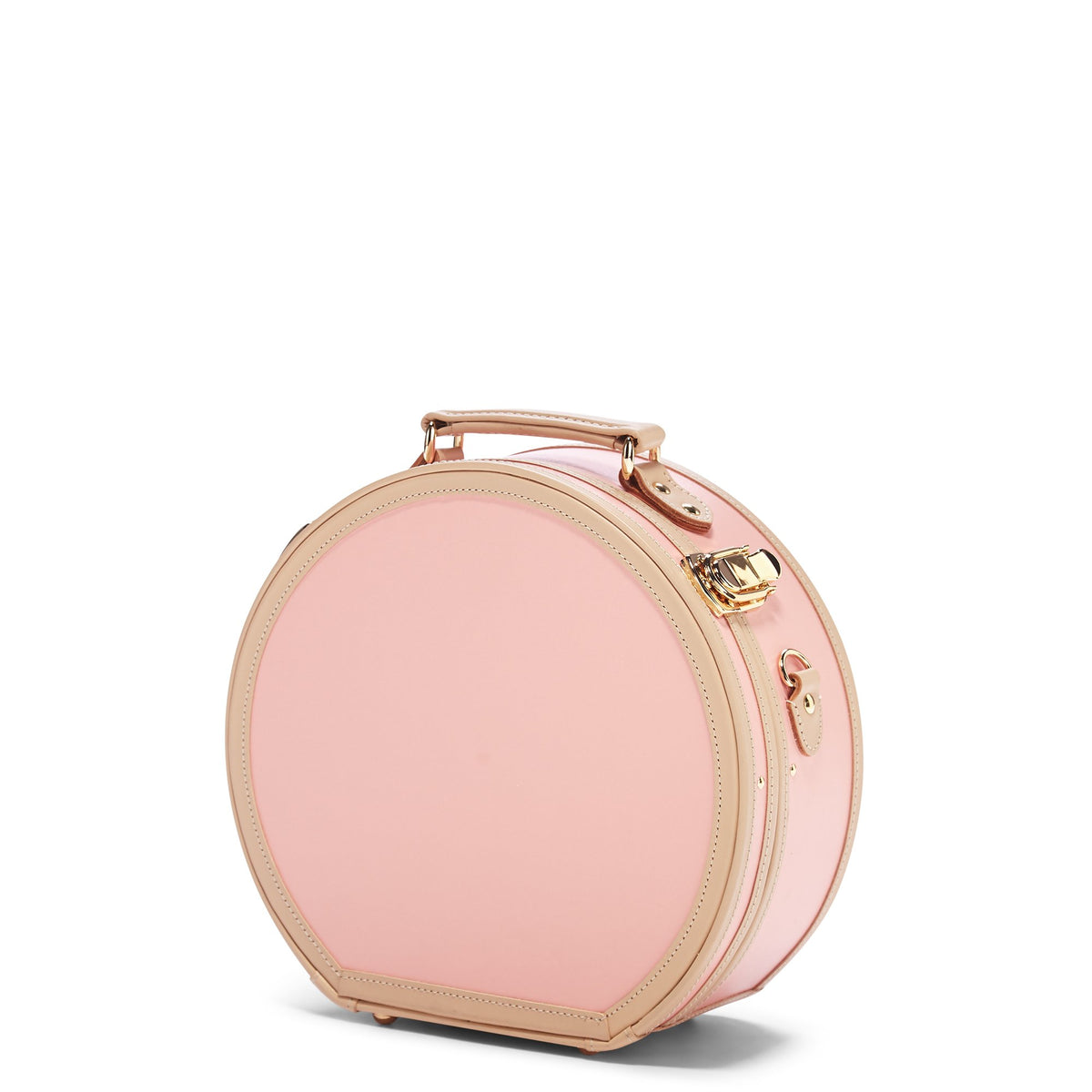 Three-quarter view of The Correspondent Pink Small Hatbox showcasing gold hardware and tan leather straps