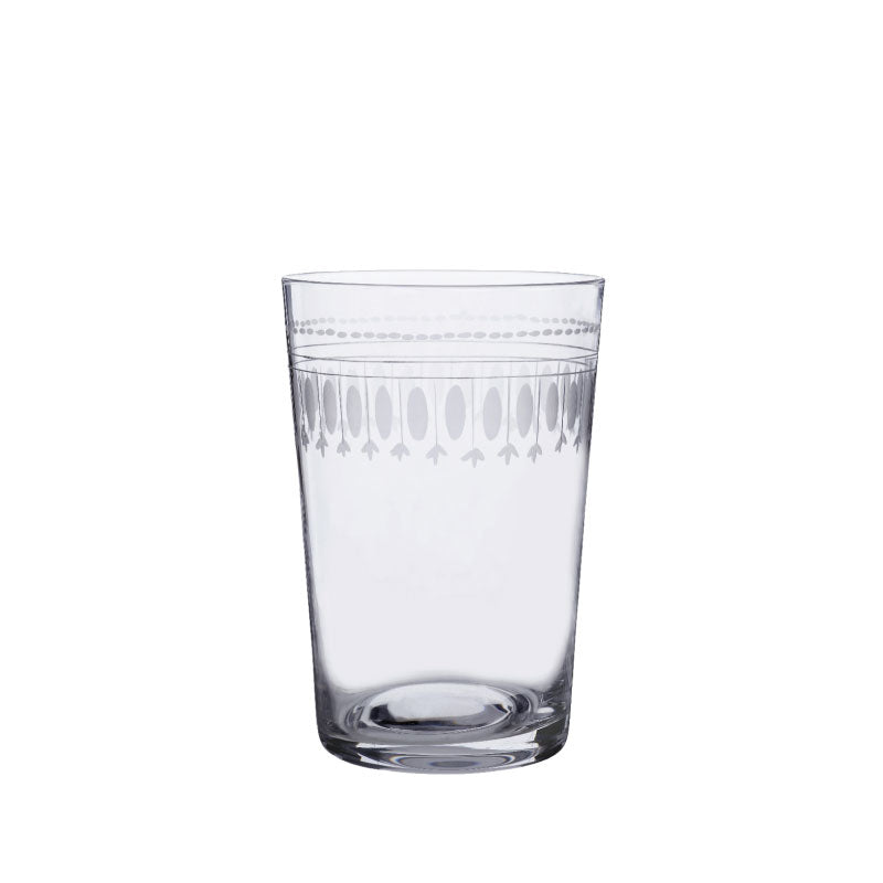 Front view of crystal tumbler showcasing hand-engraved oval pattern on clear glass against white background