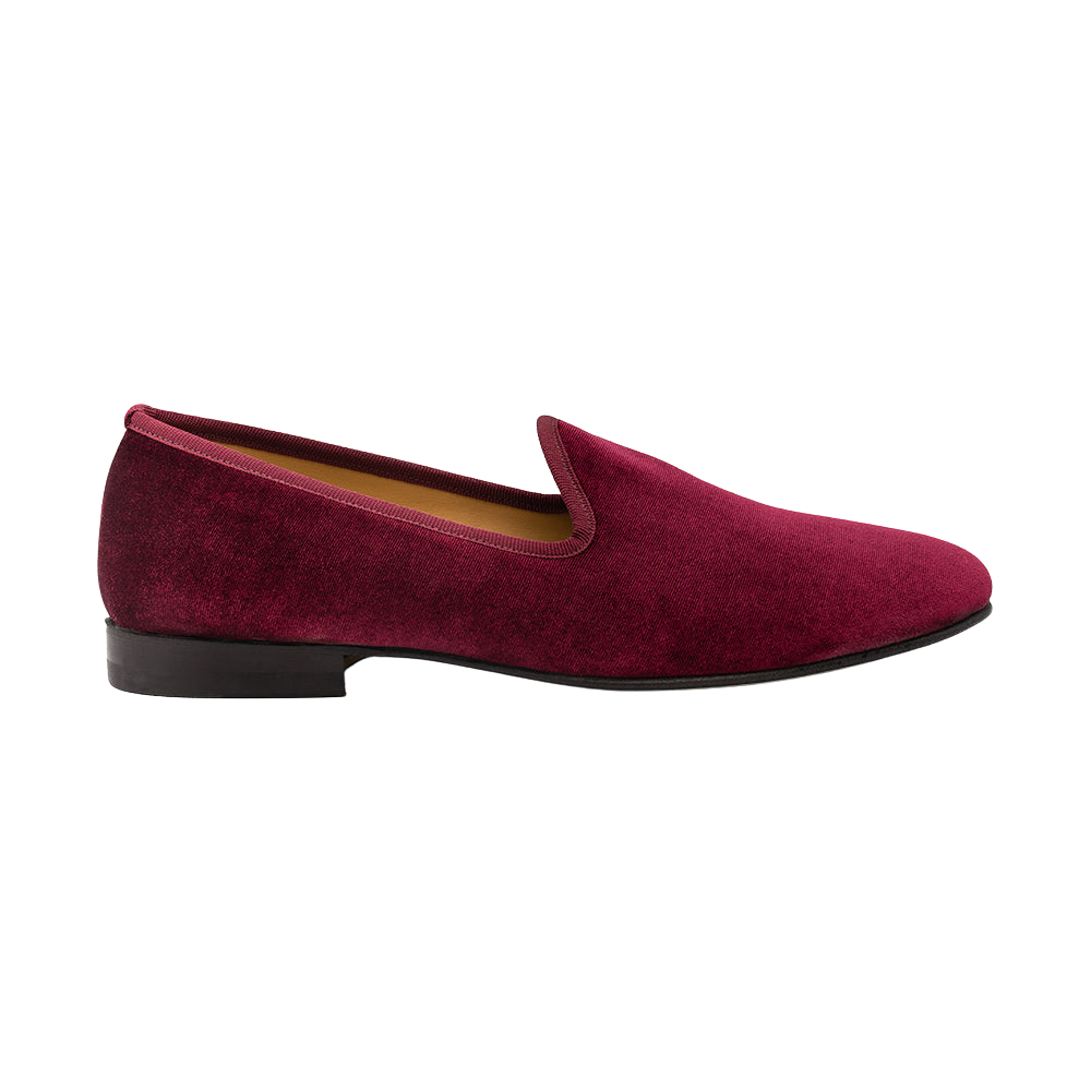 Side view of Men’s Merlot Velvet Slipper II showcasing the merlot velvet exterior and dark sole on white background