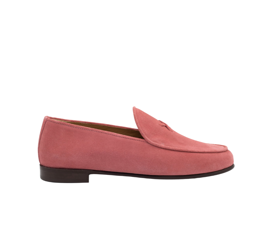 Side view of Begonia Suede Milano loafer showcasing pink suede upper and dark rubber sole on white background