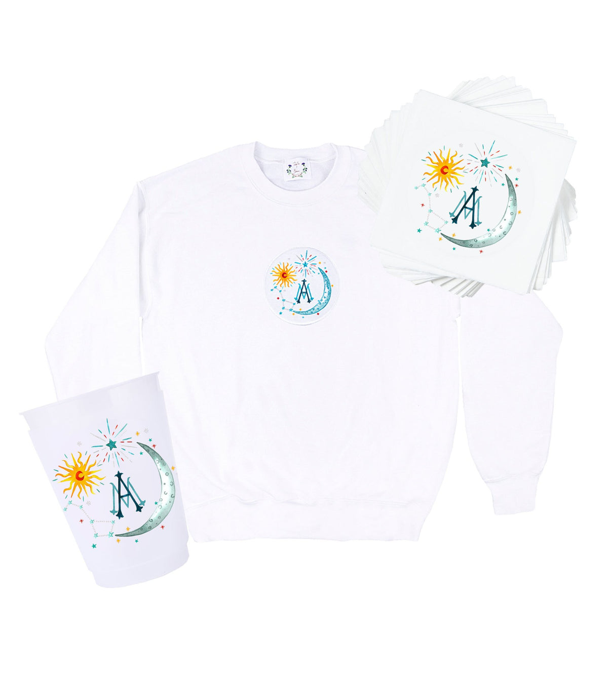 Front view of Celestial Crest bundle: white crewneck with crest, sticker stack and printed cup on white