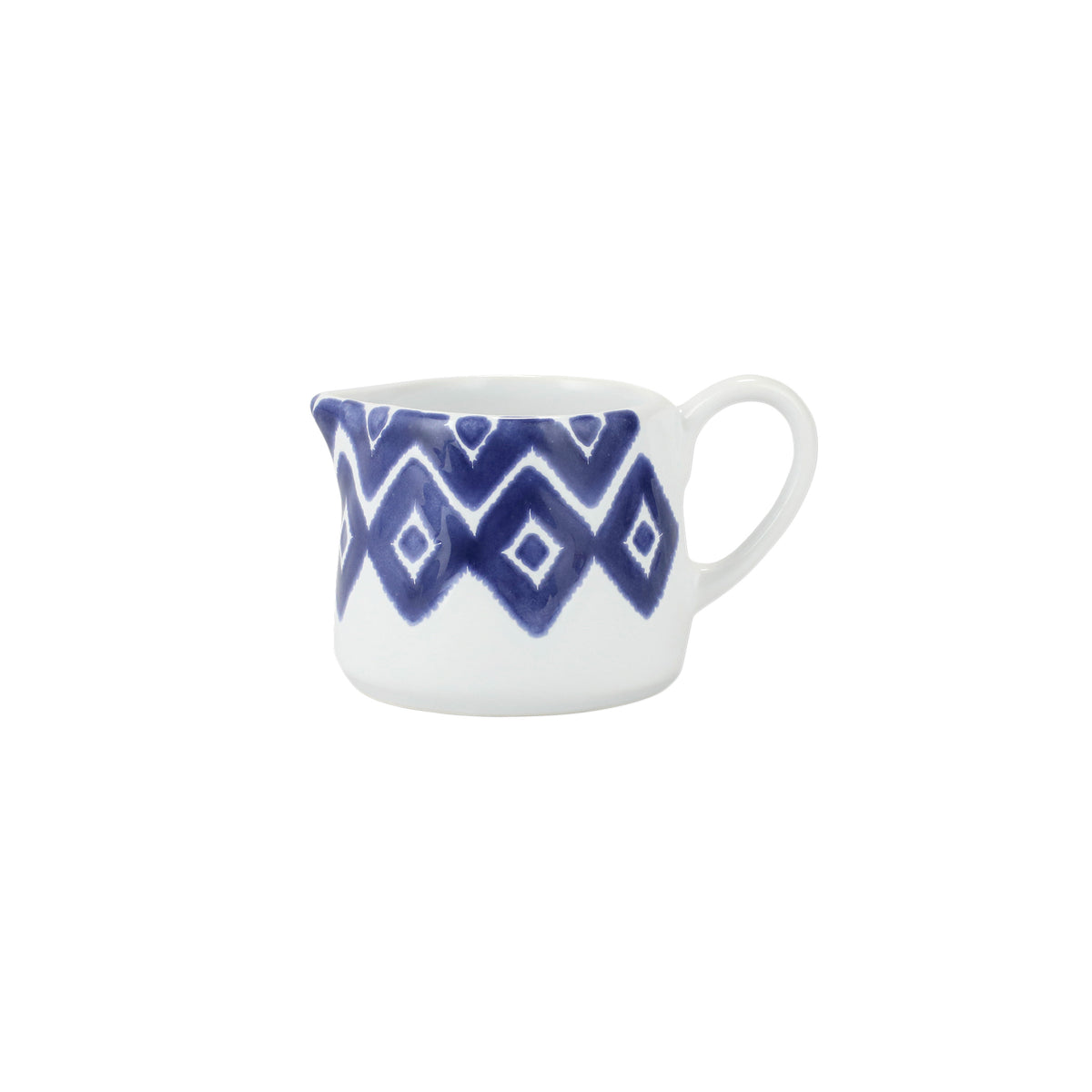 Side view of Santorini Diamond Creamer showcasing blue diamond pattern and handle with white background