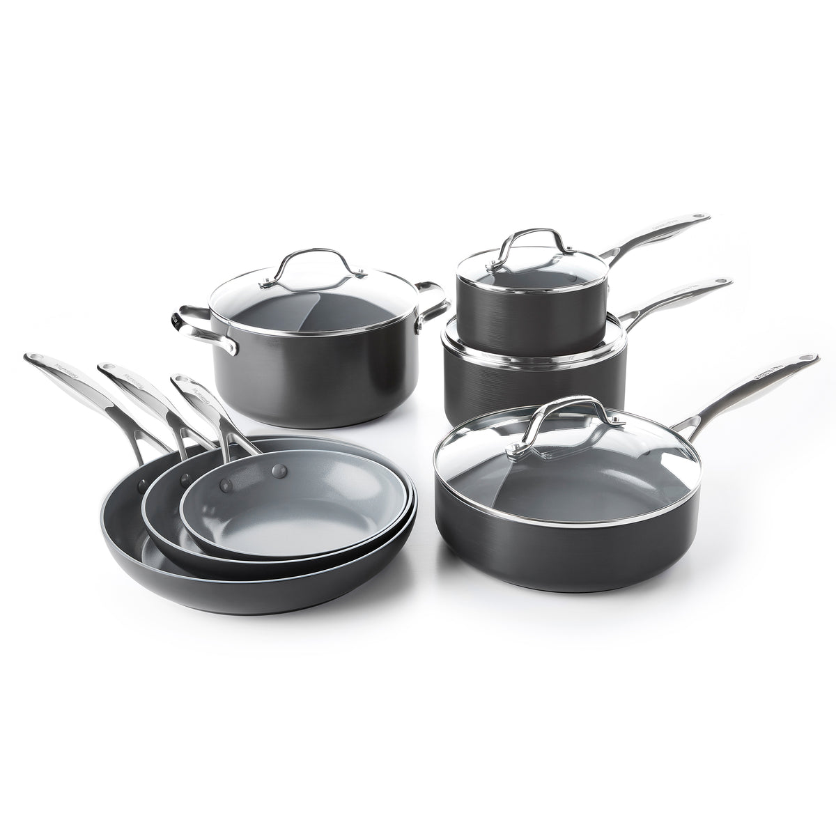 Front view of Valencia Collection 11-piece cookware set showcasing black pots, pans, and glass lids on a white background