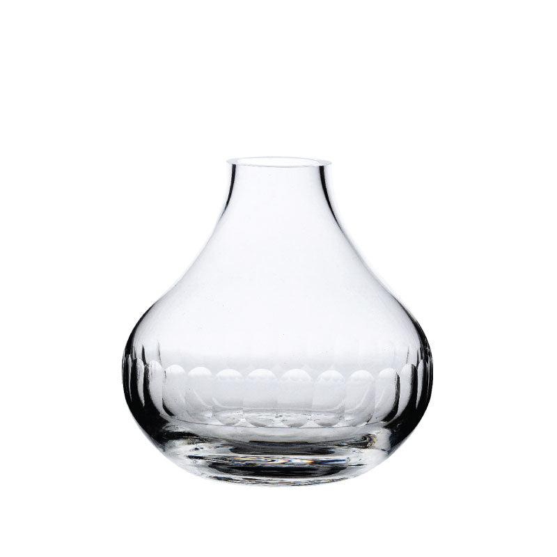 Front view of small crystal vase showcasing bulbous shape and lens-pattern band on clear glass against white background